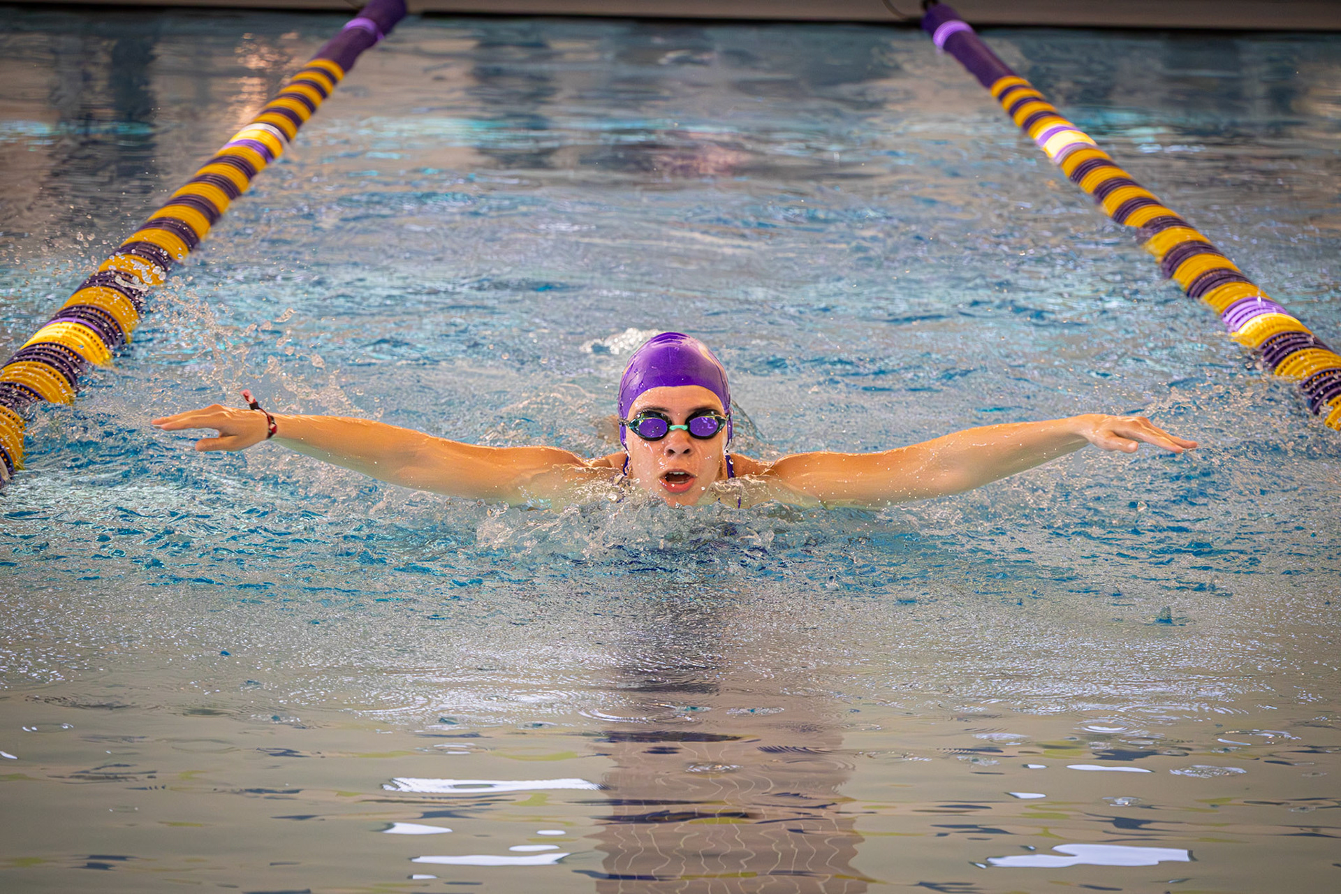 Liza flies through her 100 fly with speed and confidence. (Photo by Lena Gesing)