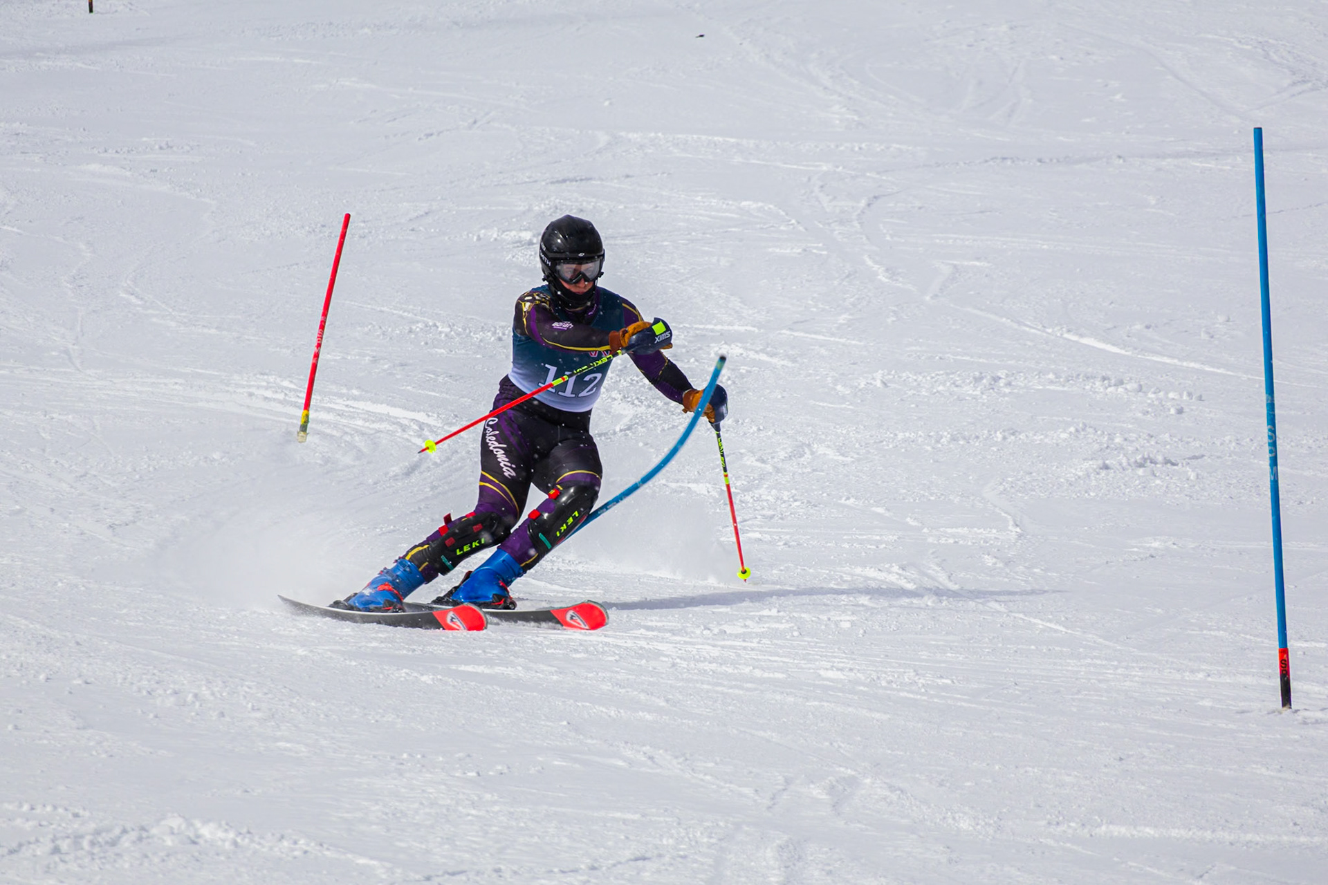 James Prichard drives hard to the finish, pumping through every gate along the way. (Photo by Justin Harper)