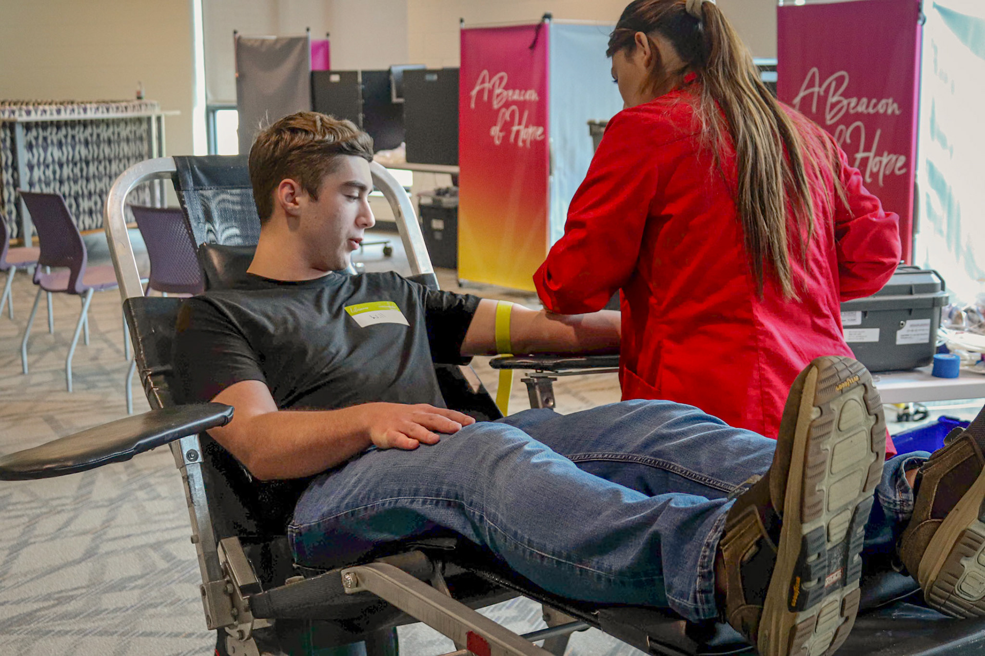 william szyperski showing kindness by giving blood though the blood drive to help the people in need. (Photo By Mariah Peterson)