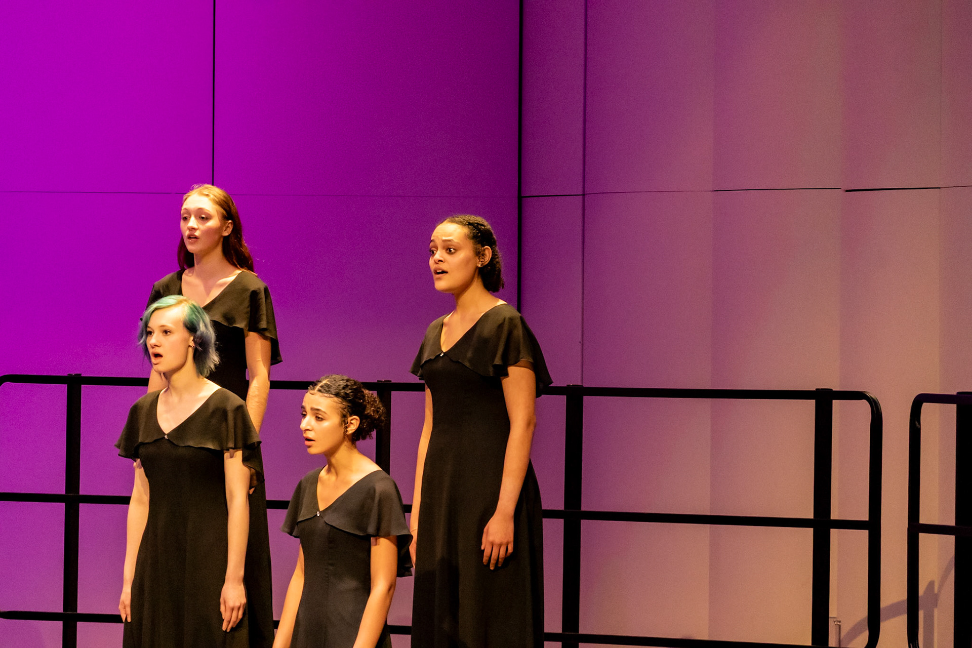 Zahare Muriithi, with Maggie Koopman, Tiona Sakala and Edyn Pitchford beautifully harmonize during the 2026 Winter Treble-Choir Concert.  (Photo by Lucas Swartz)