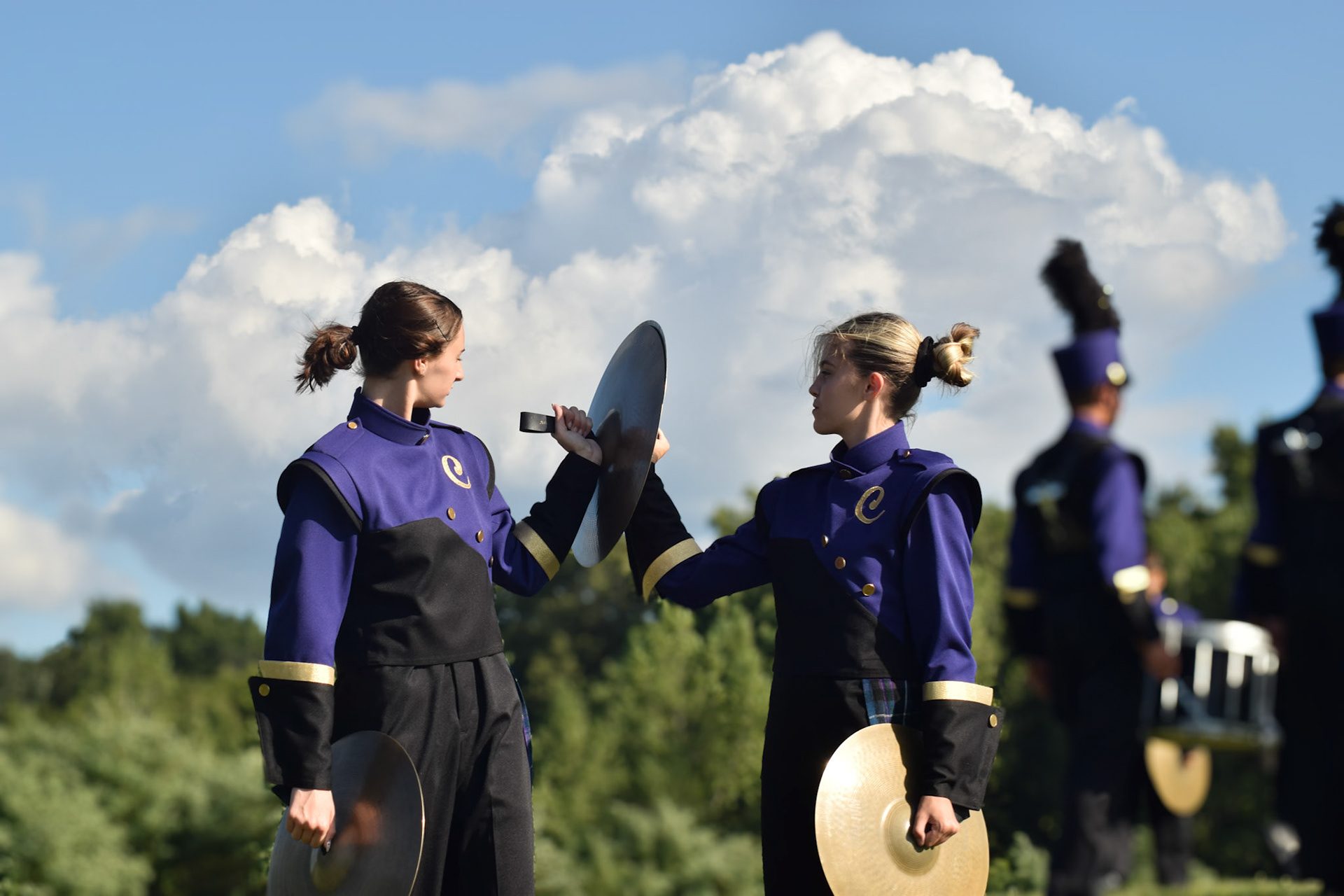MARCHING MATES Abby Bennett and Bailey VanVeelen head to practice before a big game. (Photo by OllieFox)
