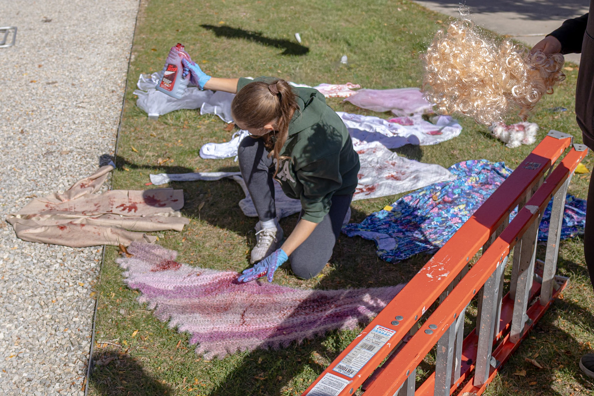 Natalie James getting bloody setting up her scene. (Photo by Madelynn Pittman)