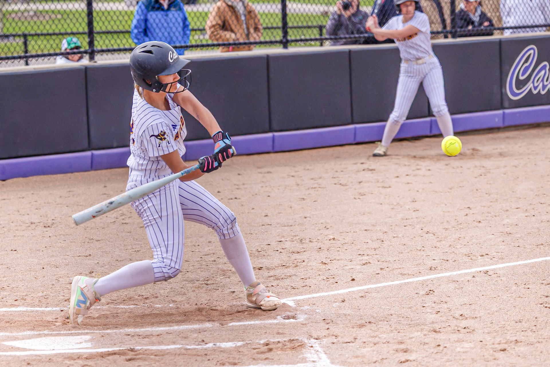 Hudsyn Tanner squares one up at the plate, sending the ball in play for the Scots. (Photo by Landry Mueller)