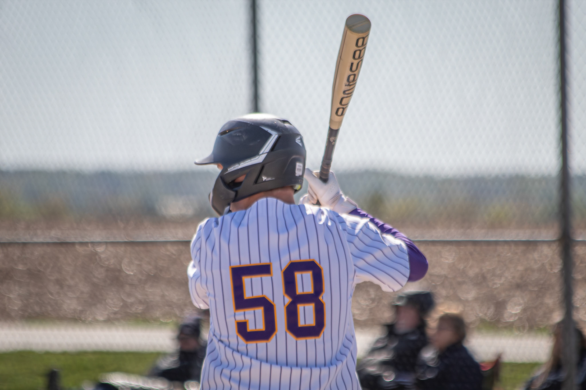 Henry Bytwork steps up to the plate, tightening his grip as he prepares to swing and run to first base. (Photo by Elsha Bytwork)
