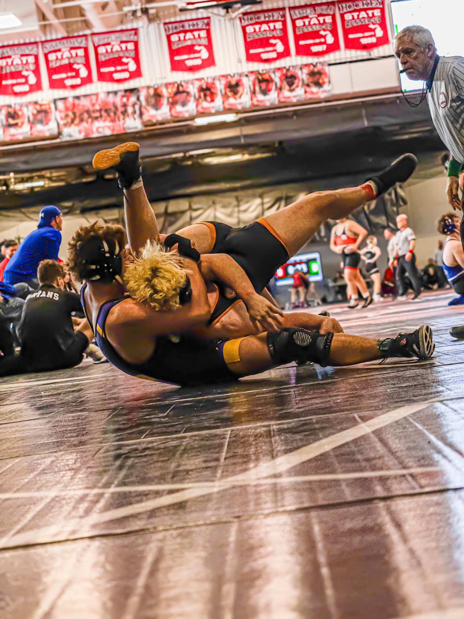 Xavier Stewart scores the win after the pin. (Photo by Jeremiah Pitman)