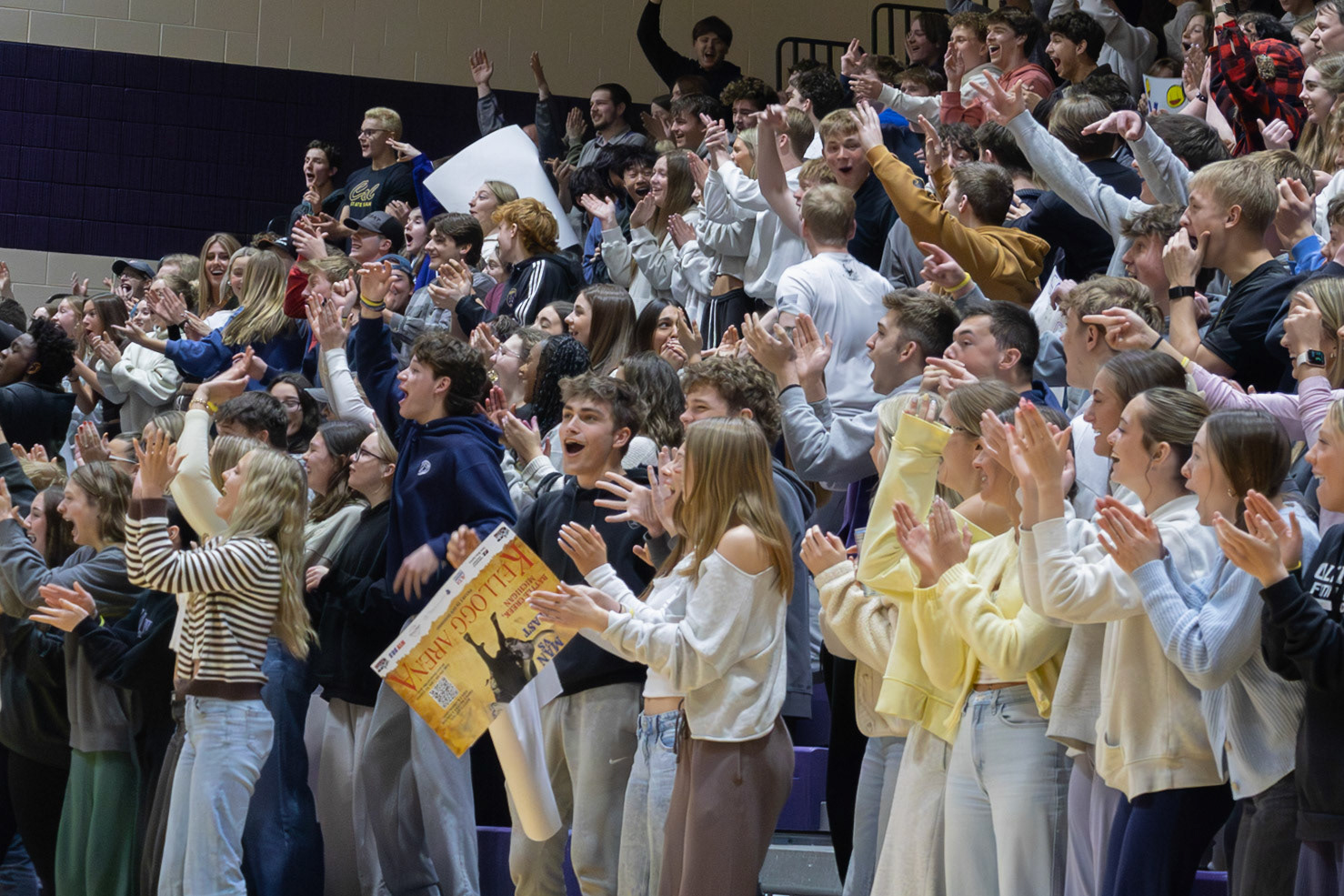 The Juniors and Seniors erupt with excitement as a Jenison player adds two points to the board. (Photo by Avarey Lippert)