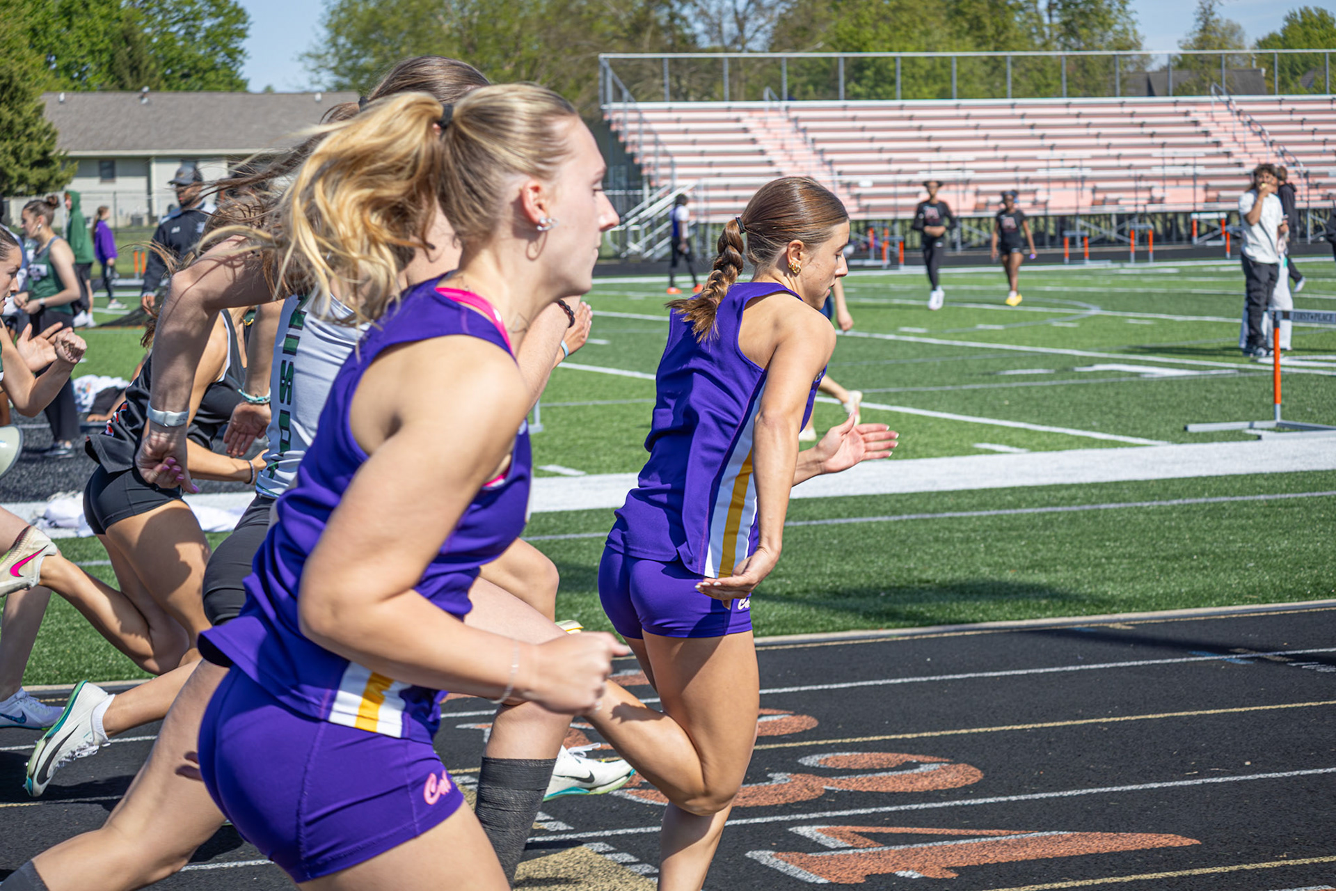 Averi Rosted leads in the 2nd heat of the 100-meter dash. (Photo by Kacy Rosted)