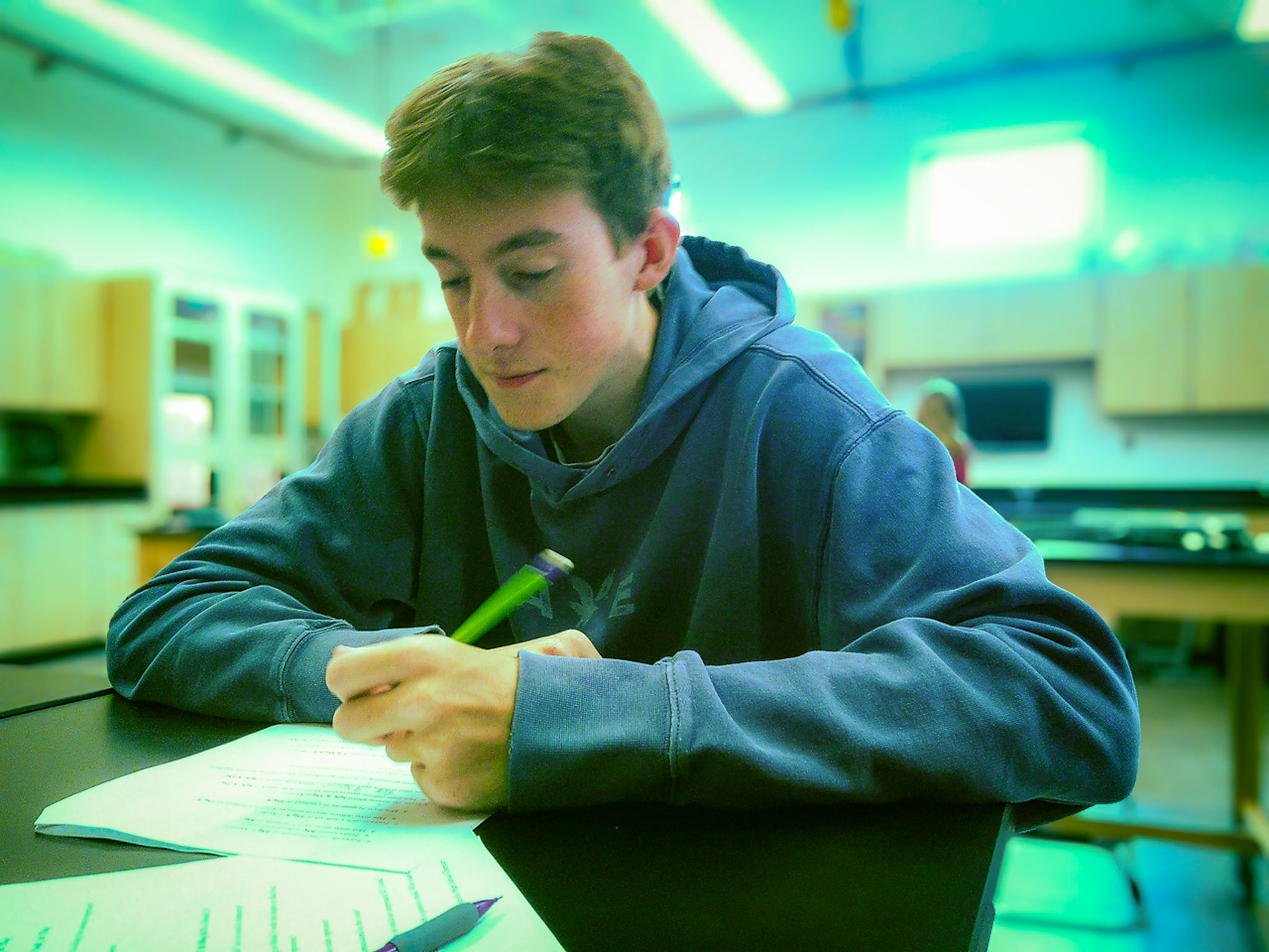 Connor Stine focuses on improving his understanding in chemistry class. (Photo by Joseph Bawi)