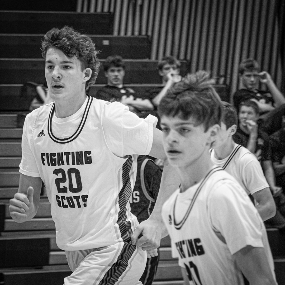 Caleb Roskiewics and Luke Miersen charge across the court. (Photo by Elsha Bytwork)