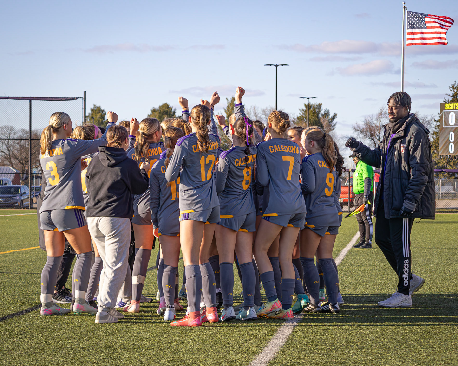 The team huddles before breaking out ahead of their big game. (Photo by Rhyan Guzman)