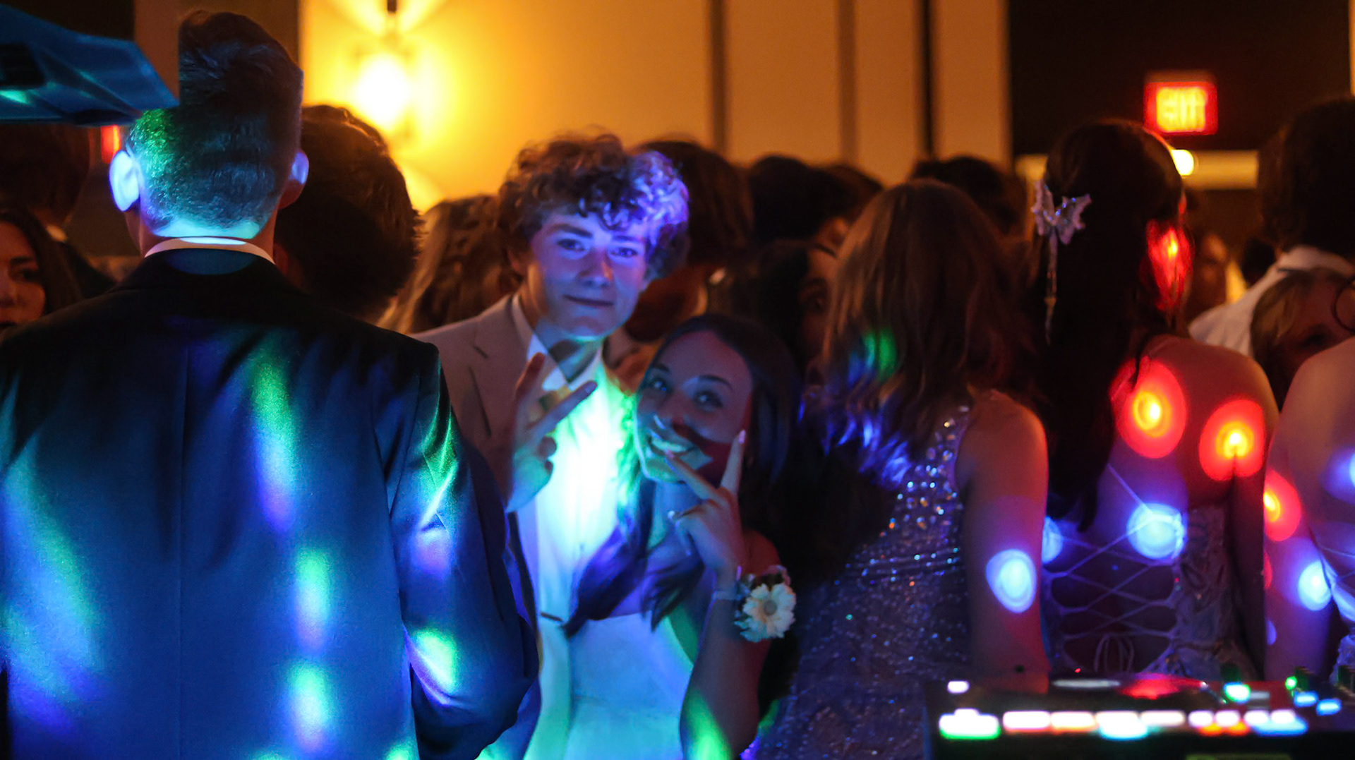 Tyden Schuch and Lauren Scheid enjoy the night together on the dance floor. (Photo by Natalia Teneyuque)