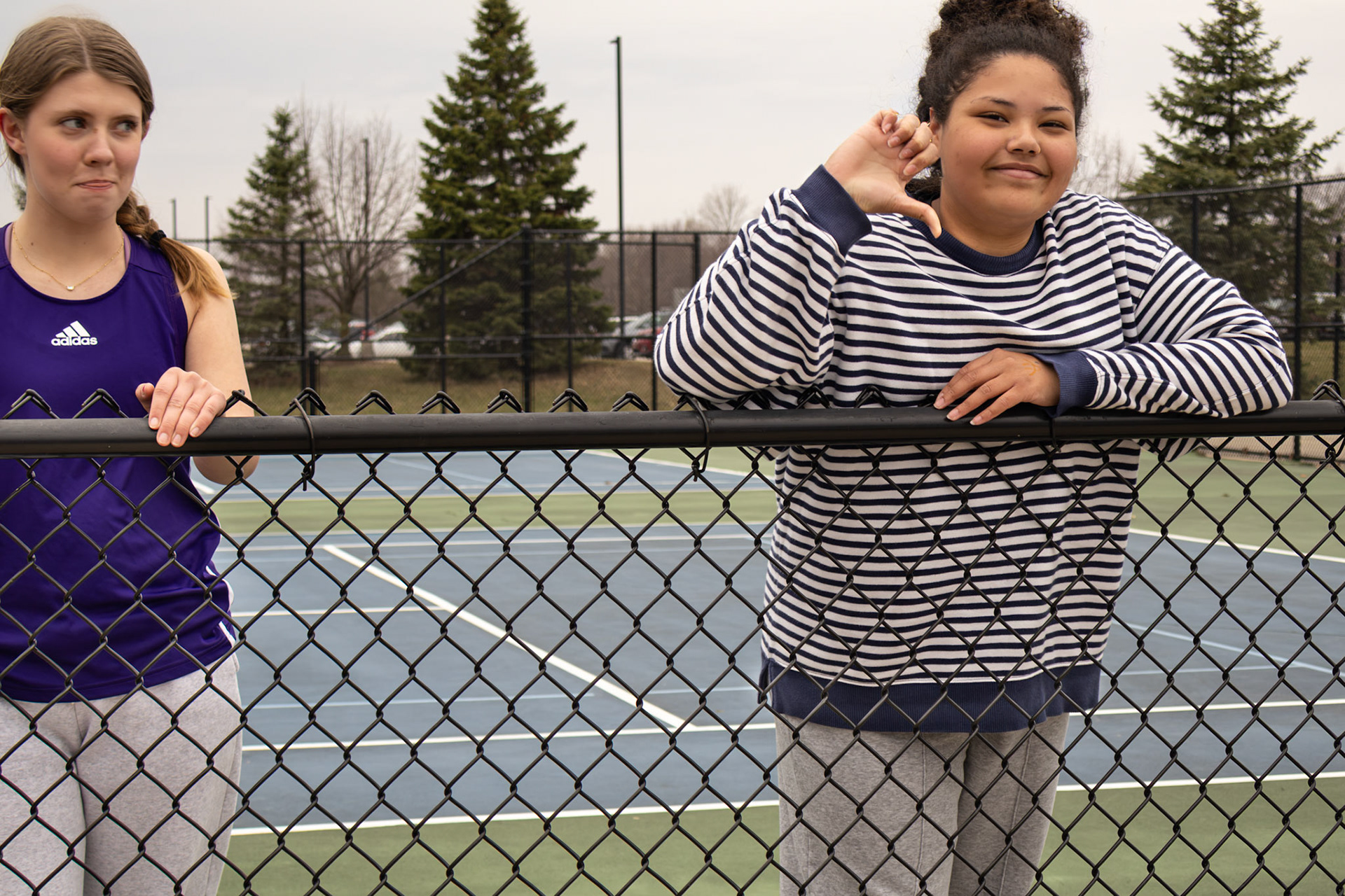 Julia Zenn shows some frustration during tennis warmups. (Photo by Ava LaBine)