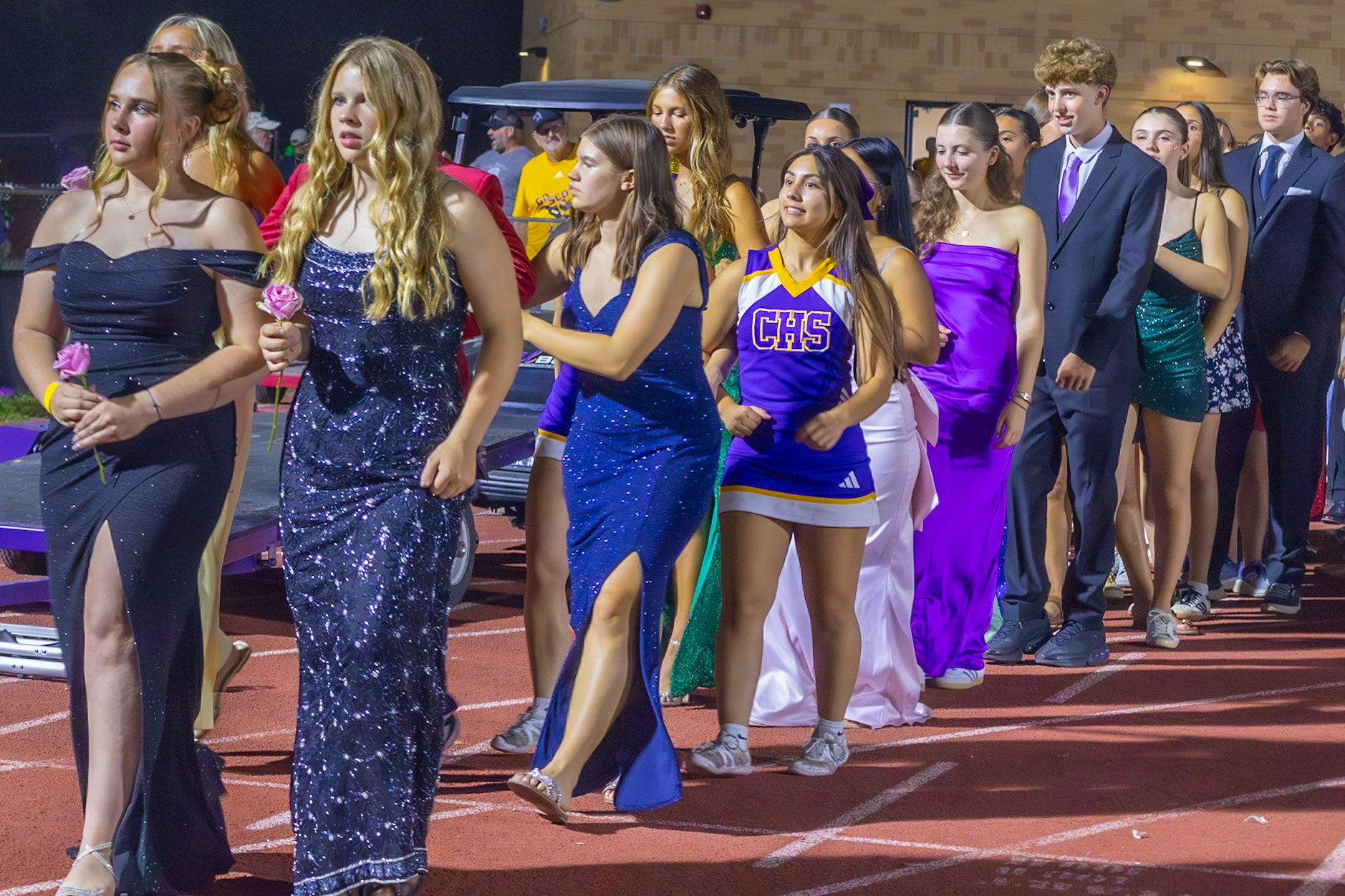 Representatives of each part of the student body wait to be called.(Photo by Milana Rico)