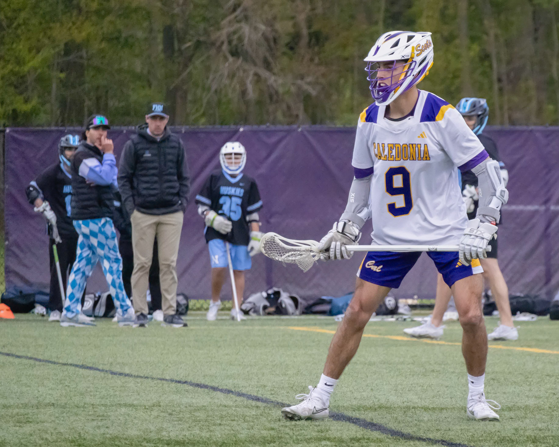 (42) In his first game back from injury, Tate Rines turns in a strong performance at faceoffs. (Photo by Ella-Grace Wickens)