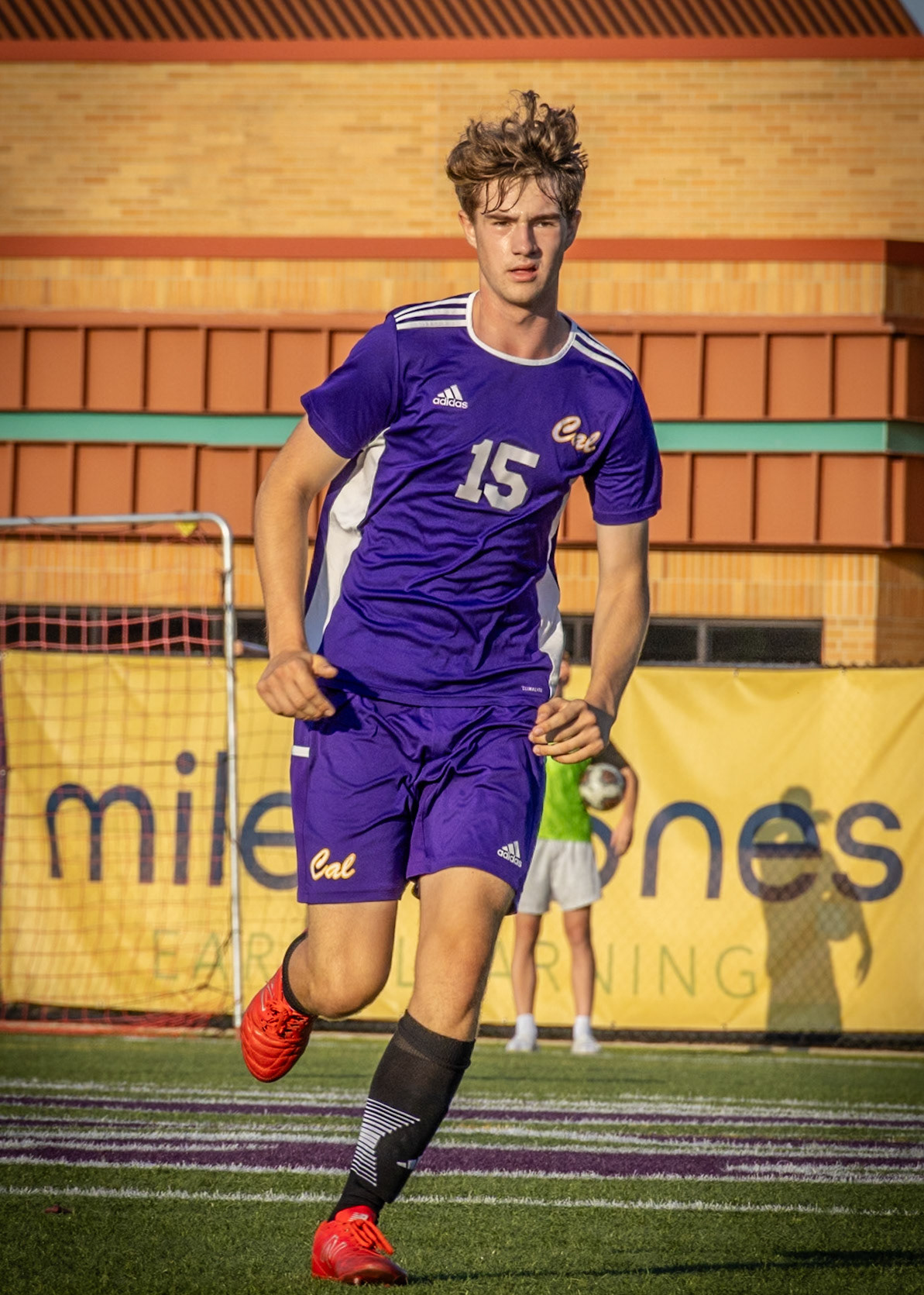 Noah Moberly caught between the sun and the middle of a play against maskegon. (Photo by Vivian Hoffman)