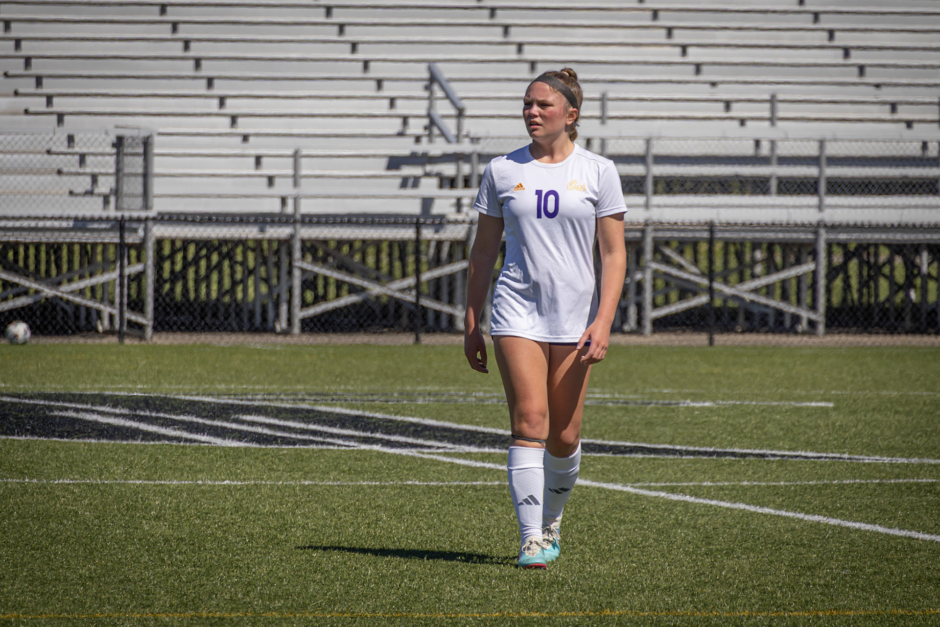Sophomore Maddie Blaser prepares to capture the ball from her opponent. (Photo by Eva Sierra)