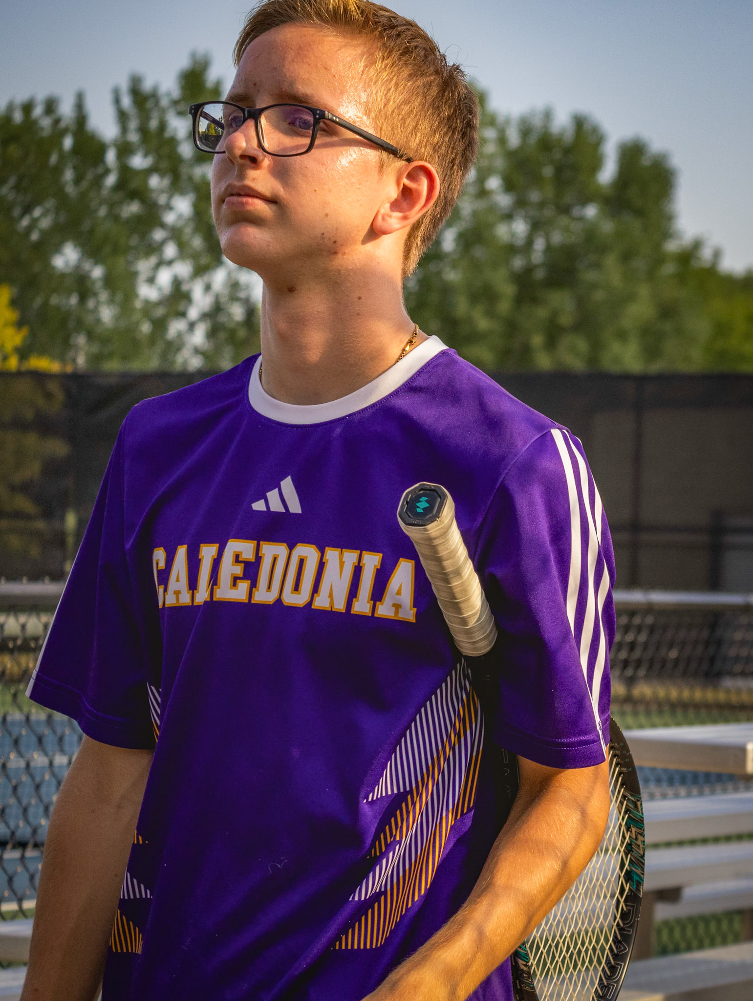 BUMP UP Zack Zupin confidantely walks out of his tennis match with a victory. (Photo by Mackenzie Popma)
