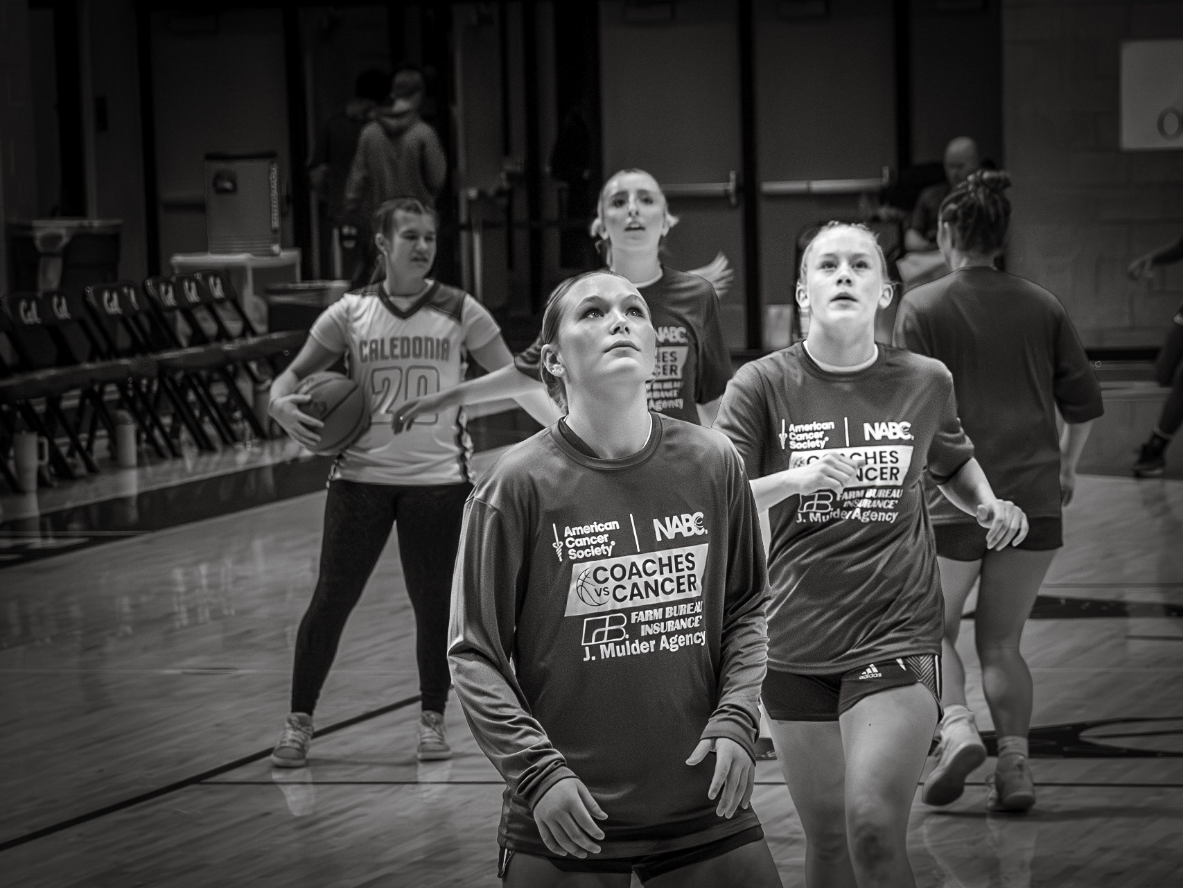 Focused on the rim, Addi Veldt prepares for a rebound during warmups. (Photo by Aibree Akers)
