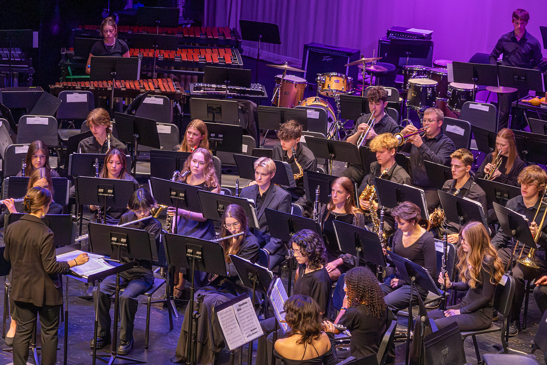 Assistant Director Mrs. Thompson directs the Symphony Band in their final song. (Photo by Eva Sierra)