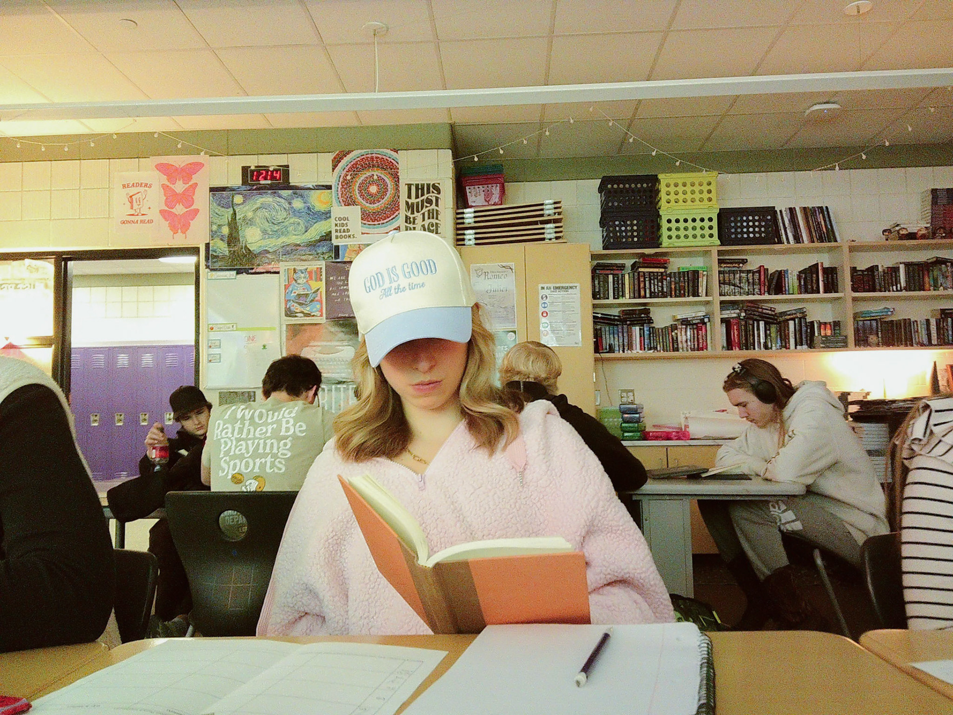 MIND IN MOTION Diving into her book, "The Last Lecture", Mackenzi Anes takes notes on a seperate piece of paper to potentially use on her speech coming up. (Photo by Ella-Grace Wickens)