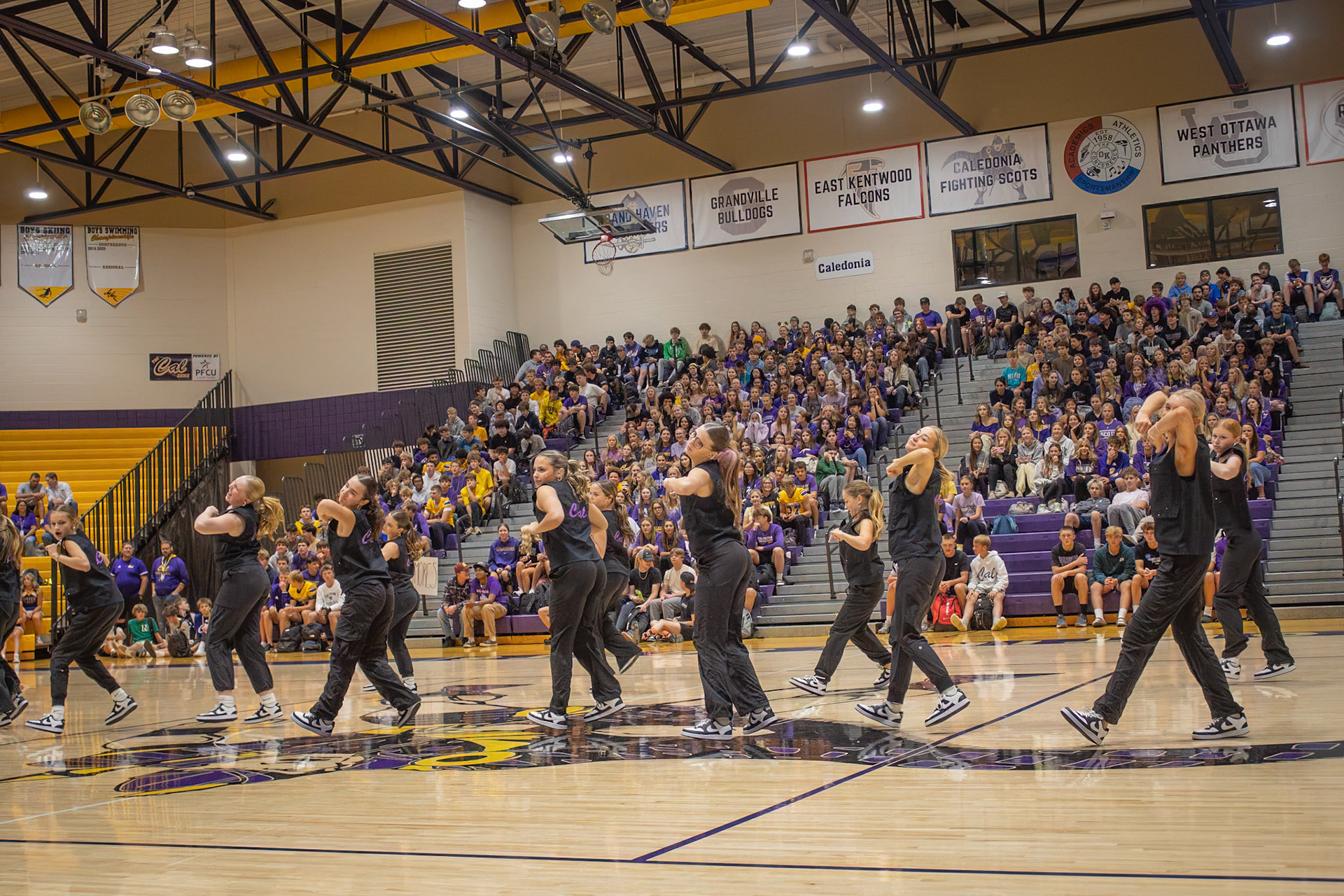 The Caledonia Dance Team energizes the crowd with a synchronized routine at the pep assembly. (Photo by Aslyn Crocker)
