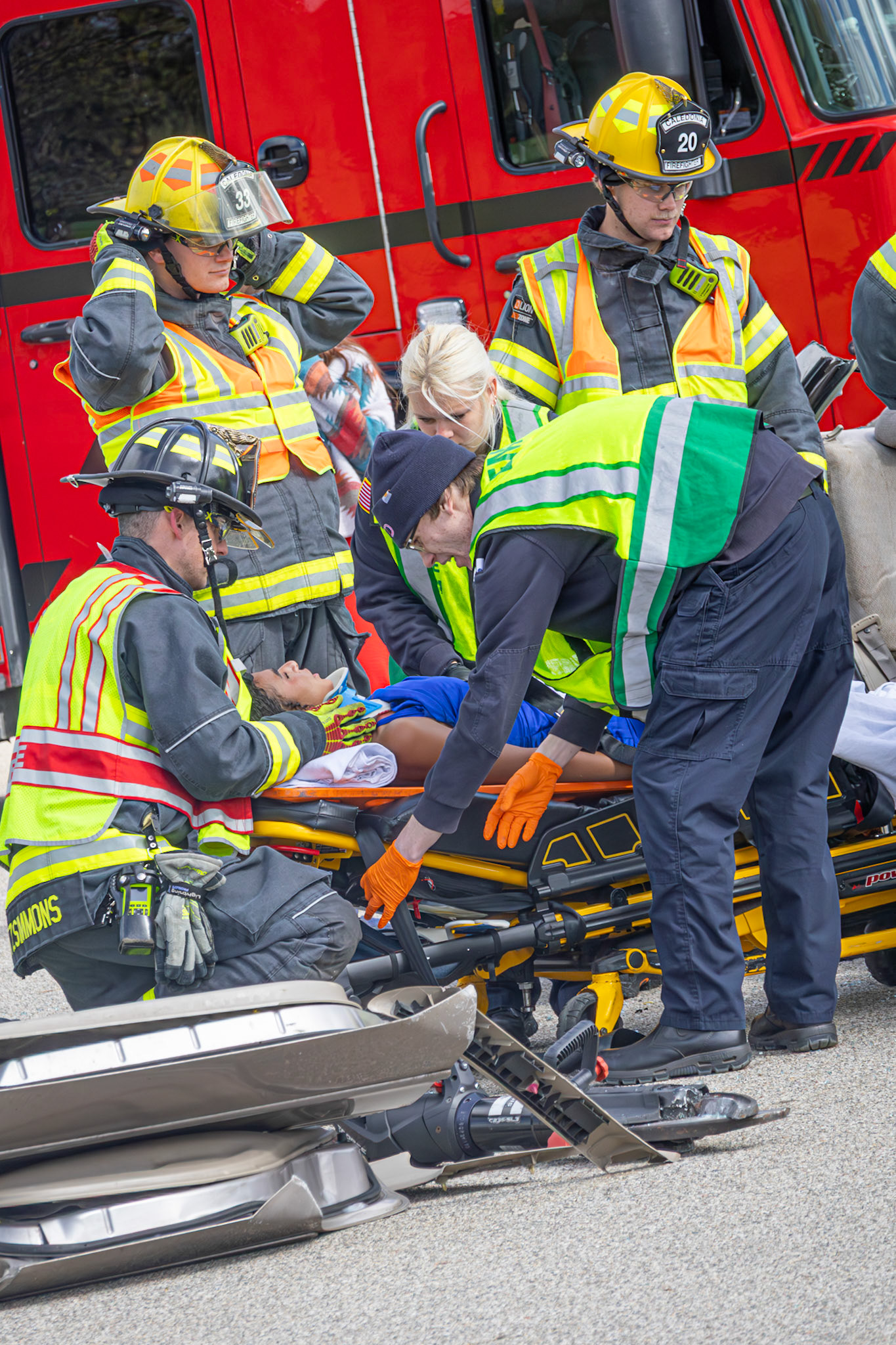A student is transported to the hospital after firefighters extricate her from the simulated crash during the safety assembly. (Photo by Jeremiah Pittman)
