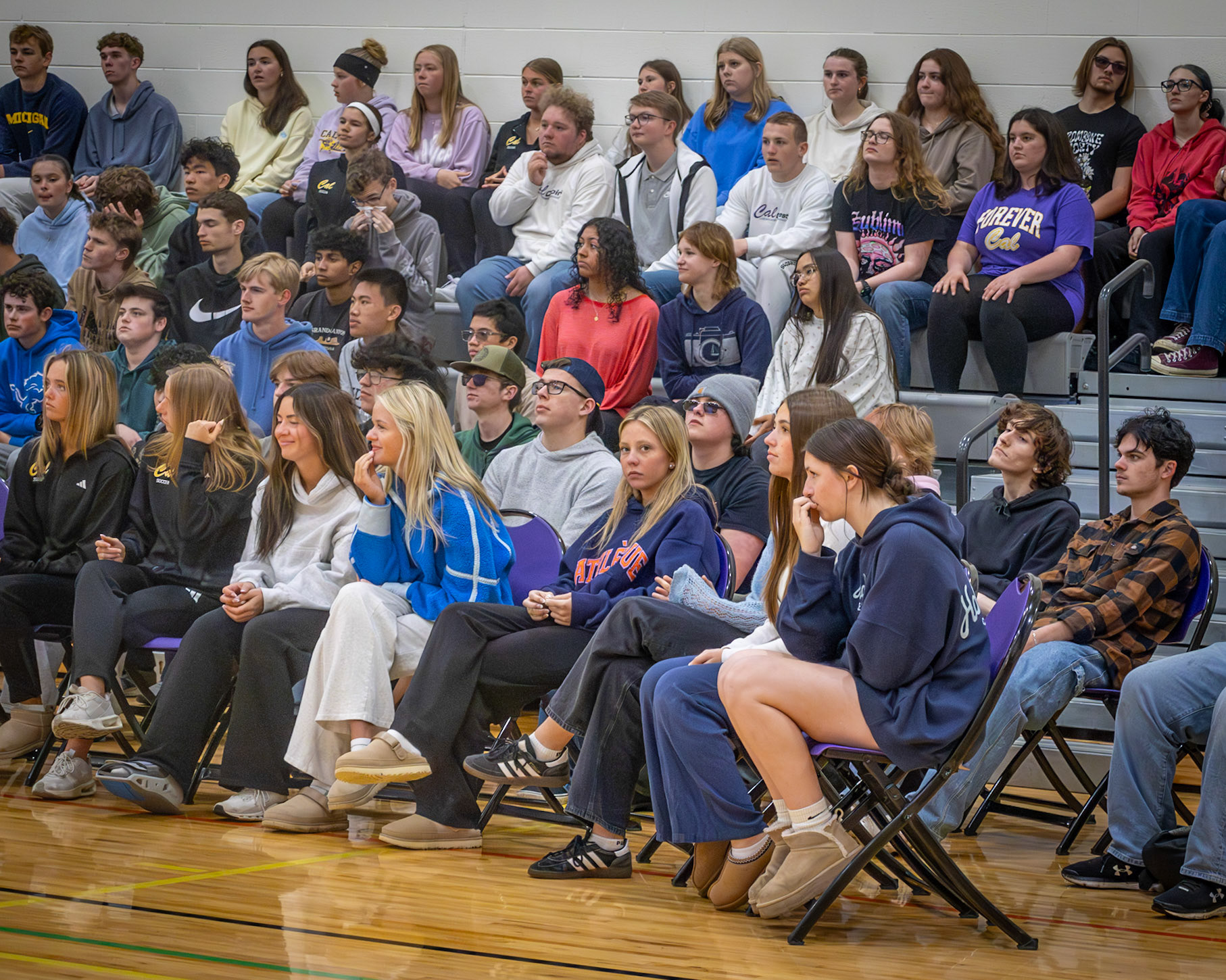 Students reflect during a memorial portion of the Distracted Driving Assembly honoring a student after a simulated crash. (Photo by Jeremiah Pittman)