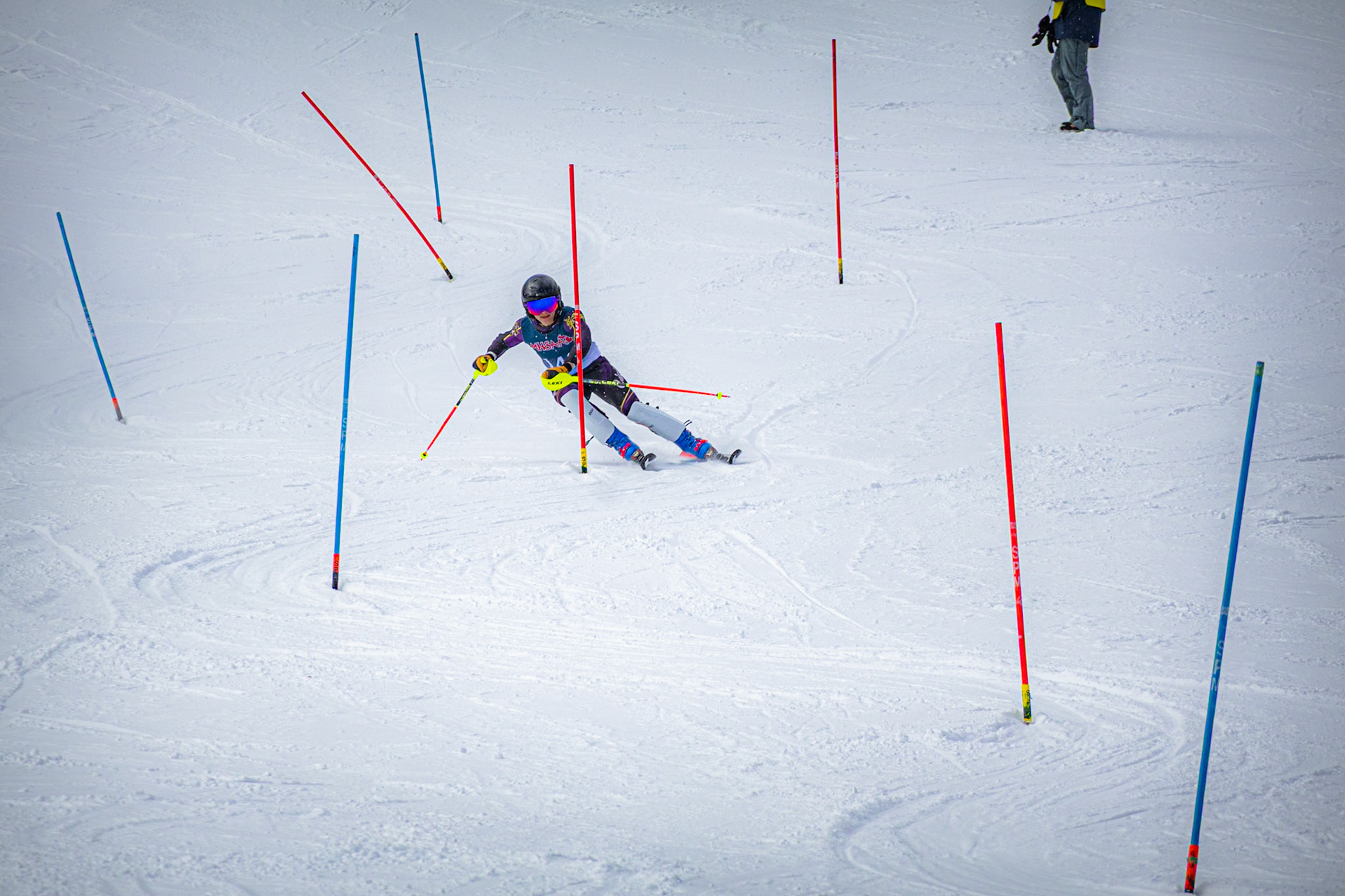 Jake Potgeter comes zooming down the hill, making quick, sharp turns as he speeds to the finish. (Photo by Justin Harper)