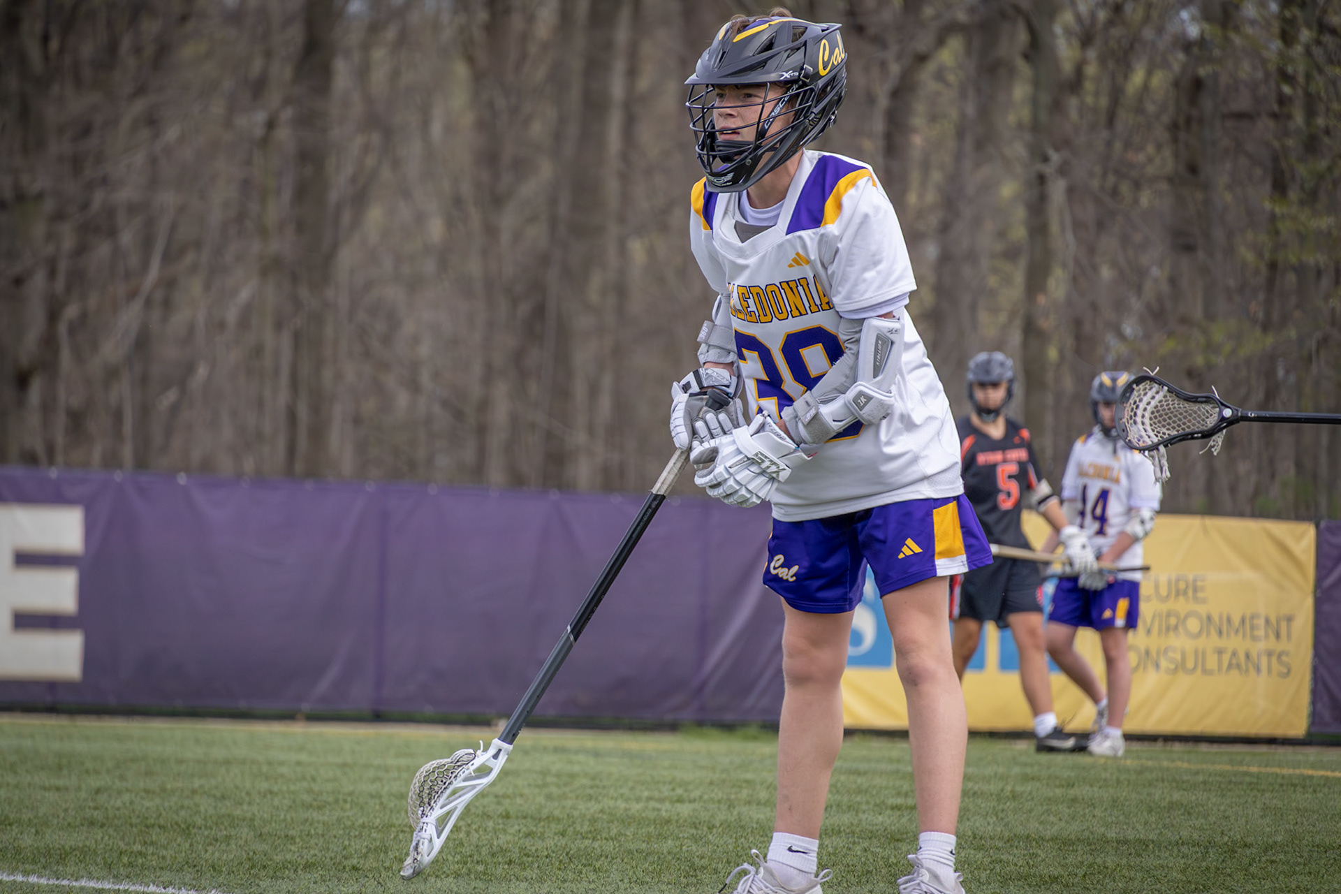 Bentley Bockheim adjusts his glove as he waits for the next play. (Photo by Owen Zvonar)