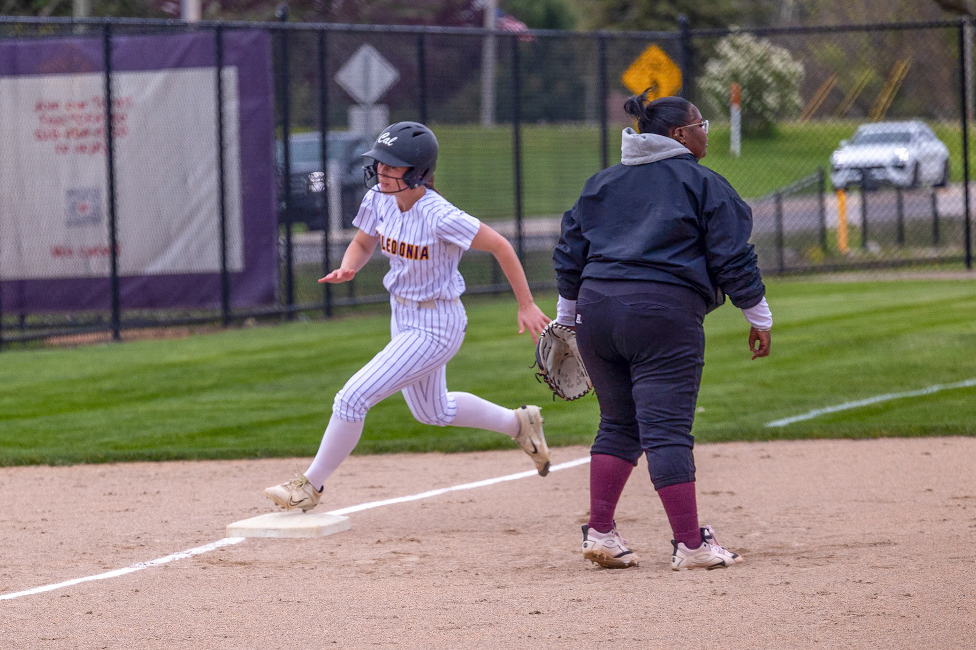 Kaitelyn Light rounds third and heads home as the Scots keep the pressure on offensively. (Photo by Landry Mueller)
