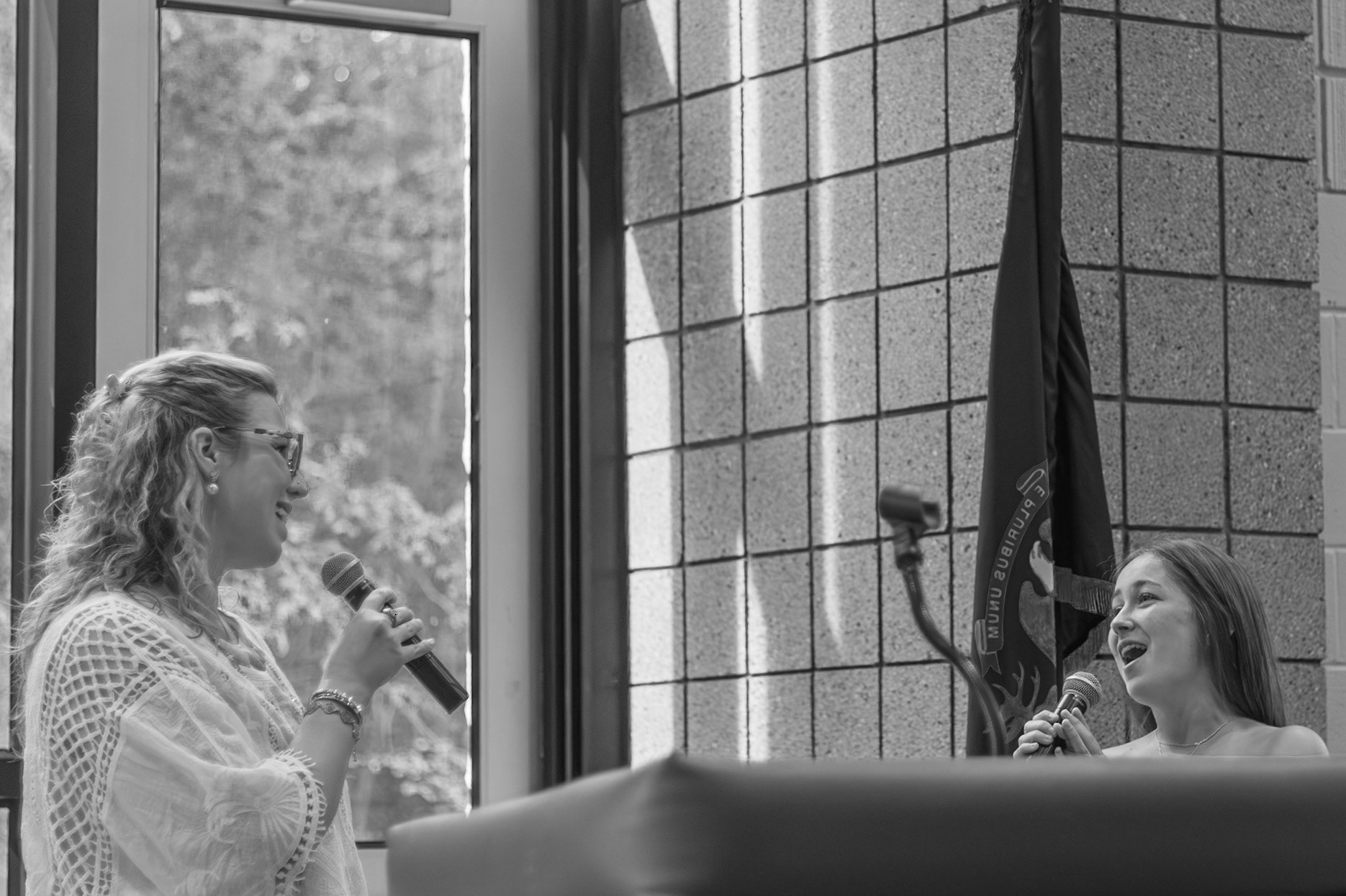Before the Mother-Daughter Breakfast, Alma Cortes Diaz sings "For Good" from Wicked as a duet with her host mom. (Photo by ElshaBytwork)