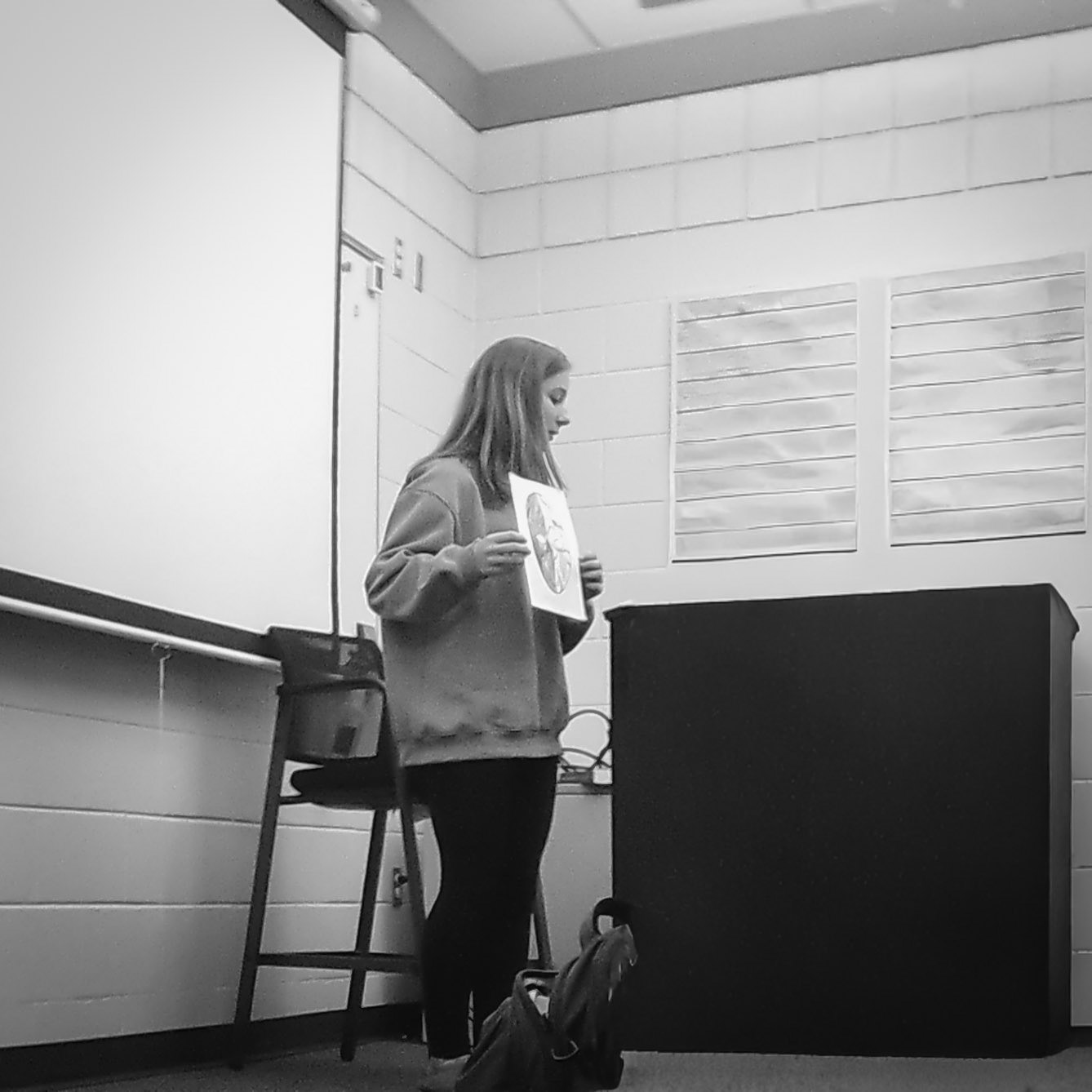 Junior Cora Draft swiftly gives her mask presentation for World Literature. (Photo by Thomas McKee)