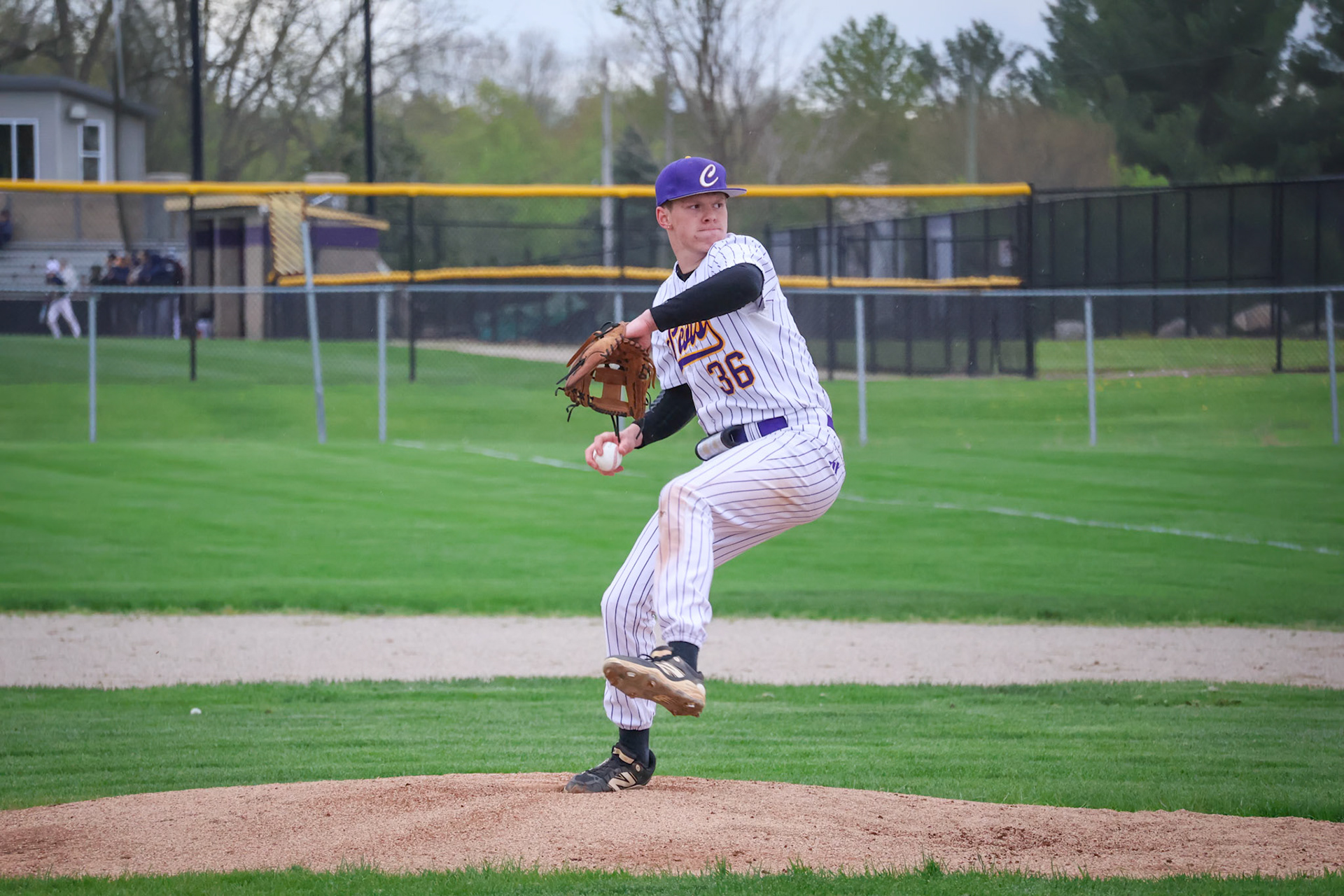 Evan Crater winds up to throw his next pitch. (Photo by Emma Garza)