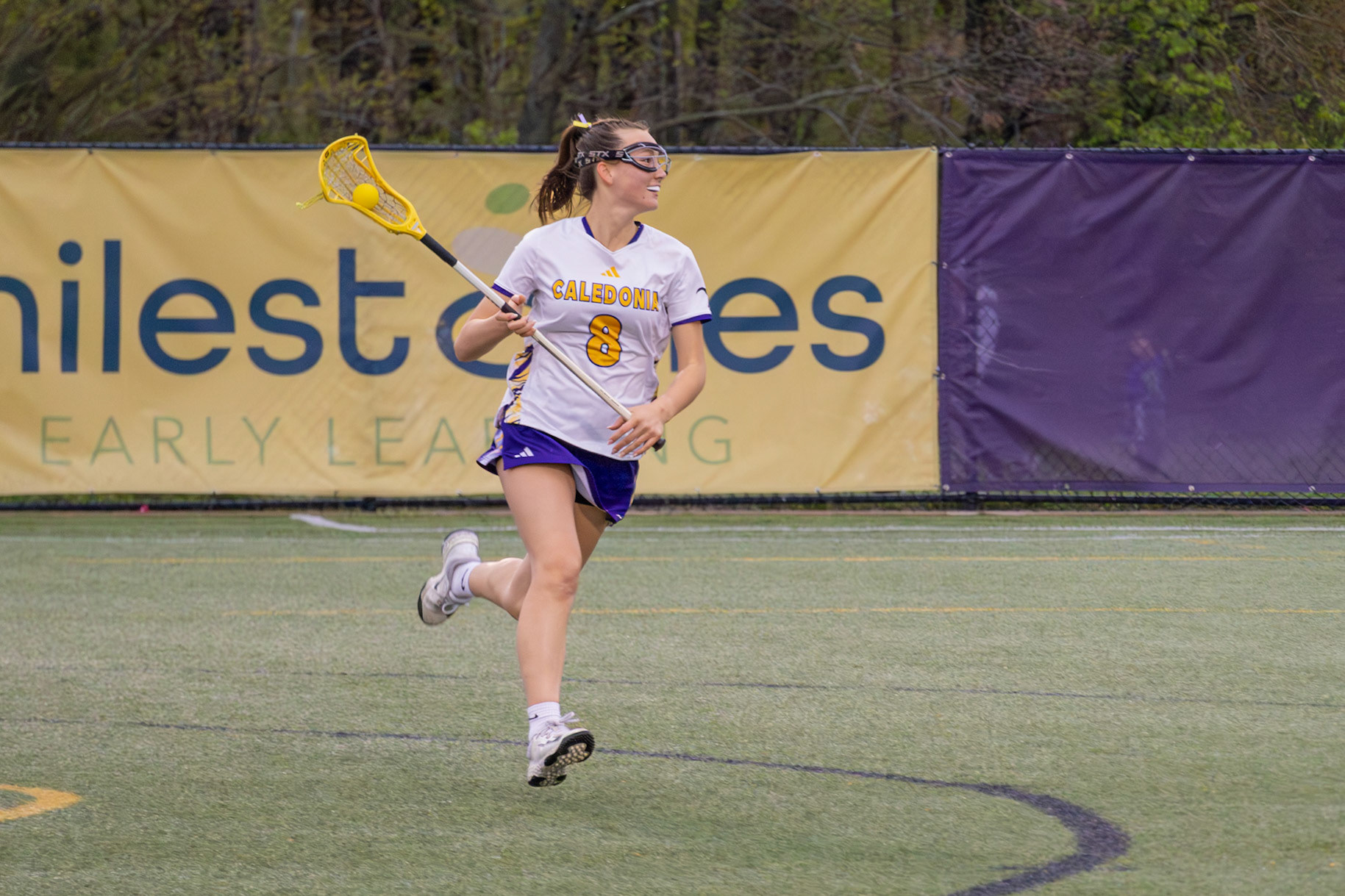 Morgan Barthel charges forward with the ball, reading the field before making a play that ends in a goal. (Photo by Abby Skibinski)