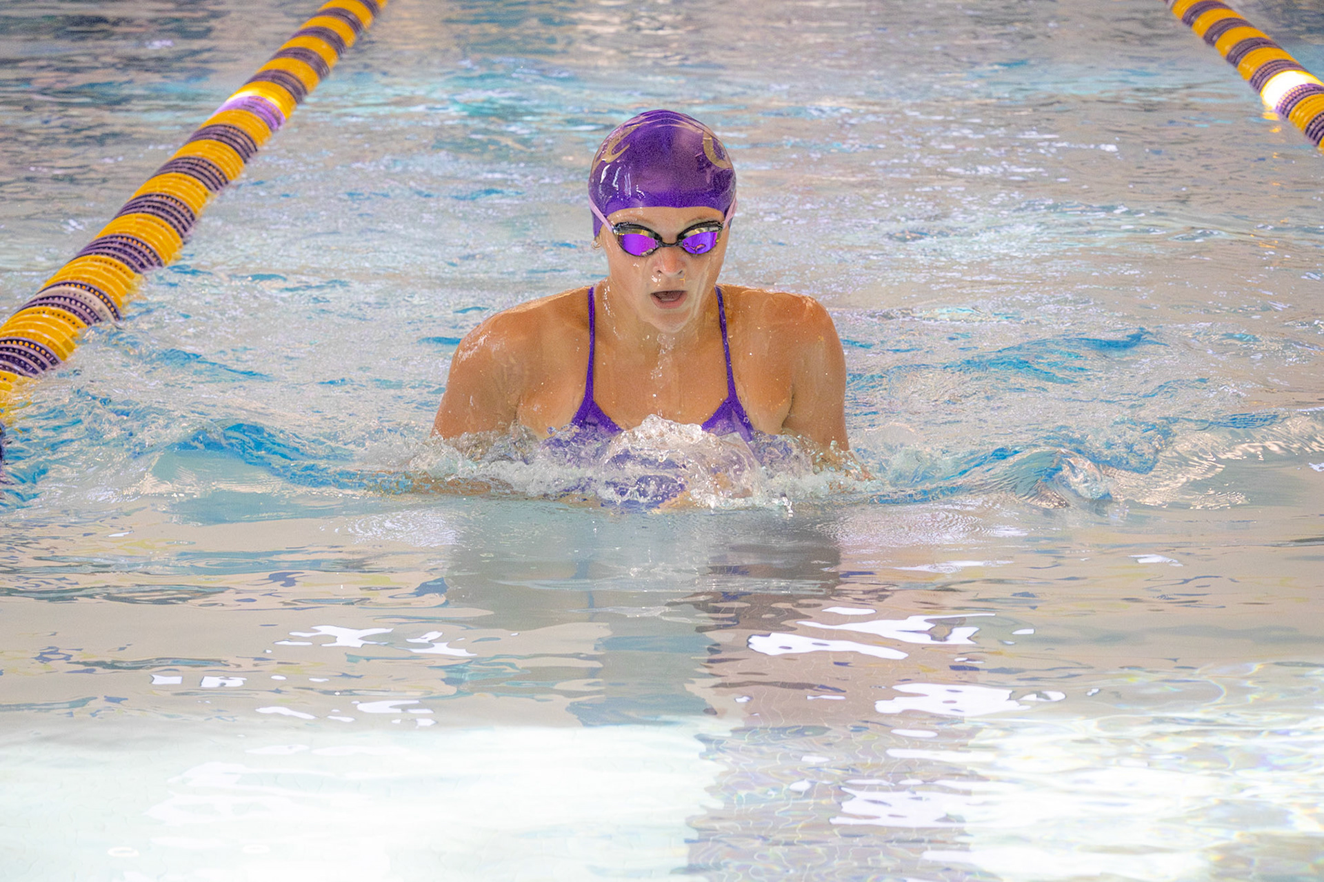 LOCKED IN  Ellery Almy stays focused, pushing forward with each stroke. (Photo by Lena Gesing)