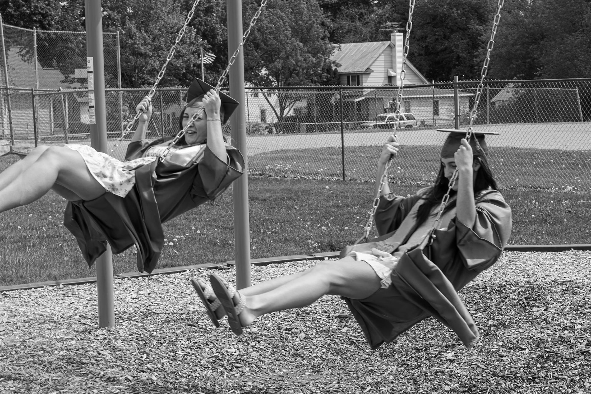 Gabrielle Linker and Jocelyn Martinez play on their childhood playground one last time. (Photo by Sophie Grajewski)