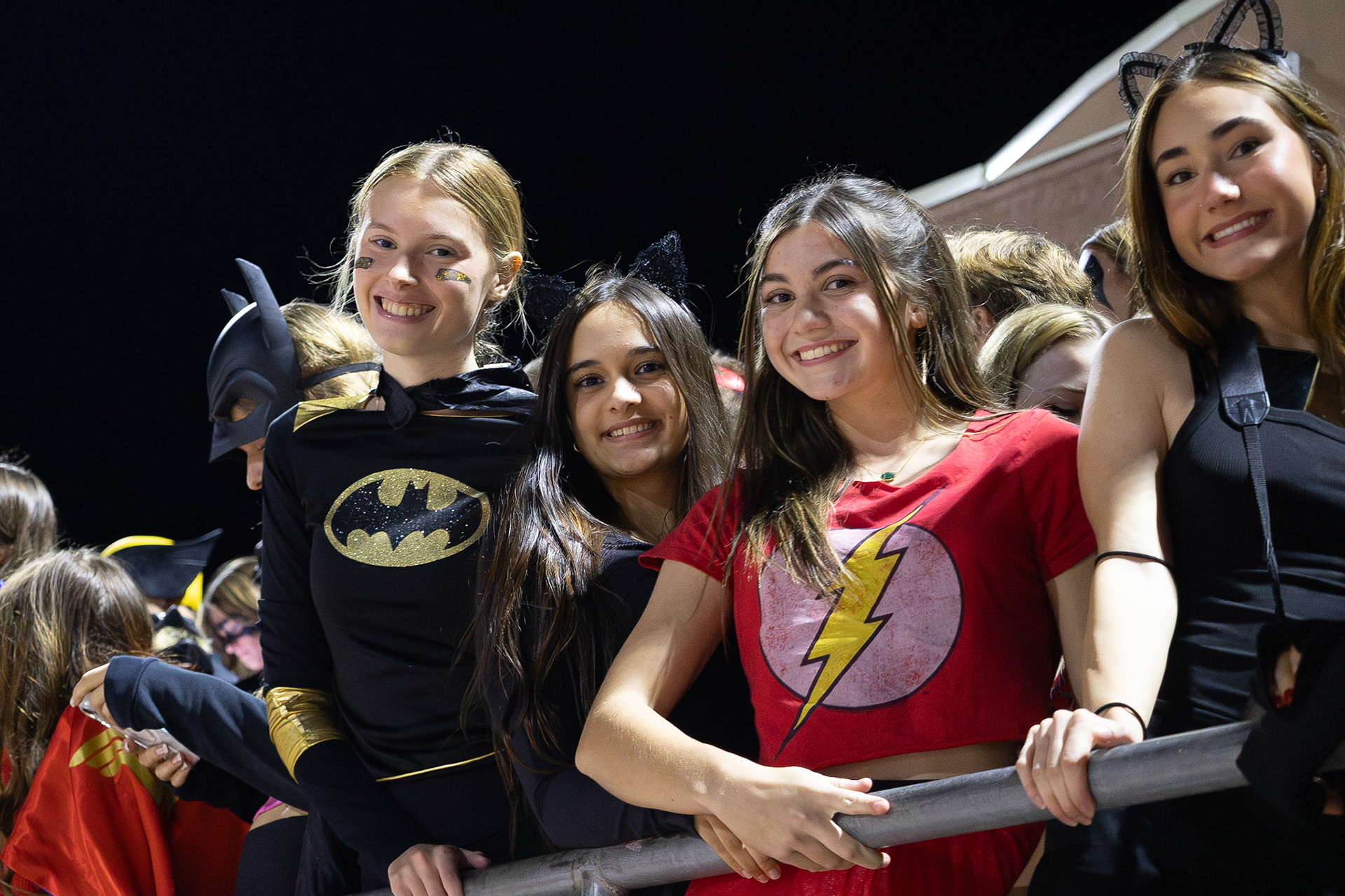 These four students dress up for “Superhero Out,” each representing a different hero. (Photo by Abby Skibinski)