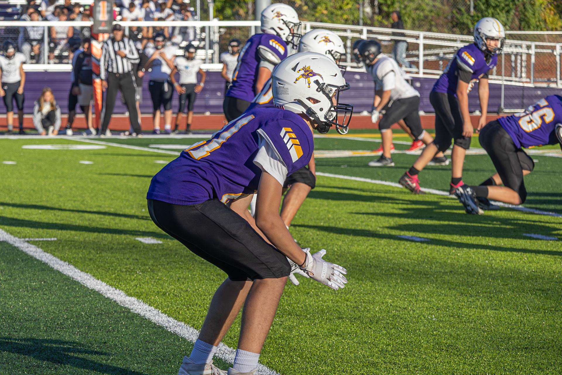 Getting in his set position Connor Hollister prepares himself to guard one of West Ottowa's starting recievers. (Photo by Ella-Grace Wickens)