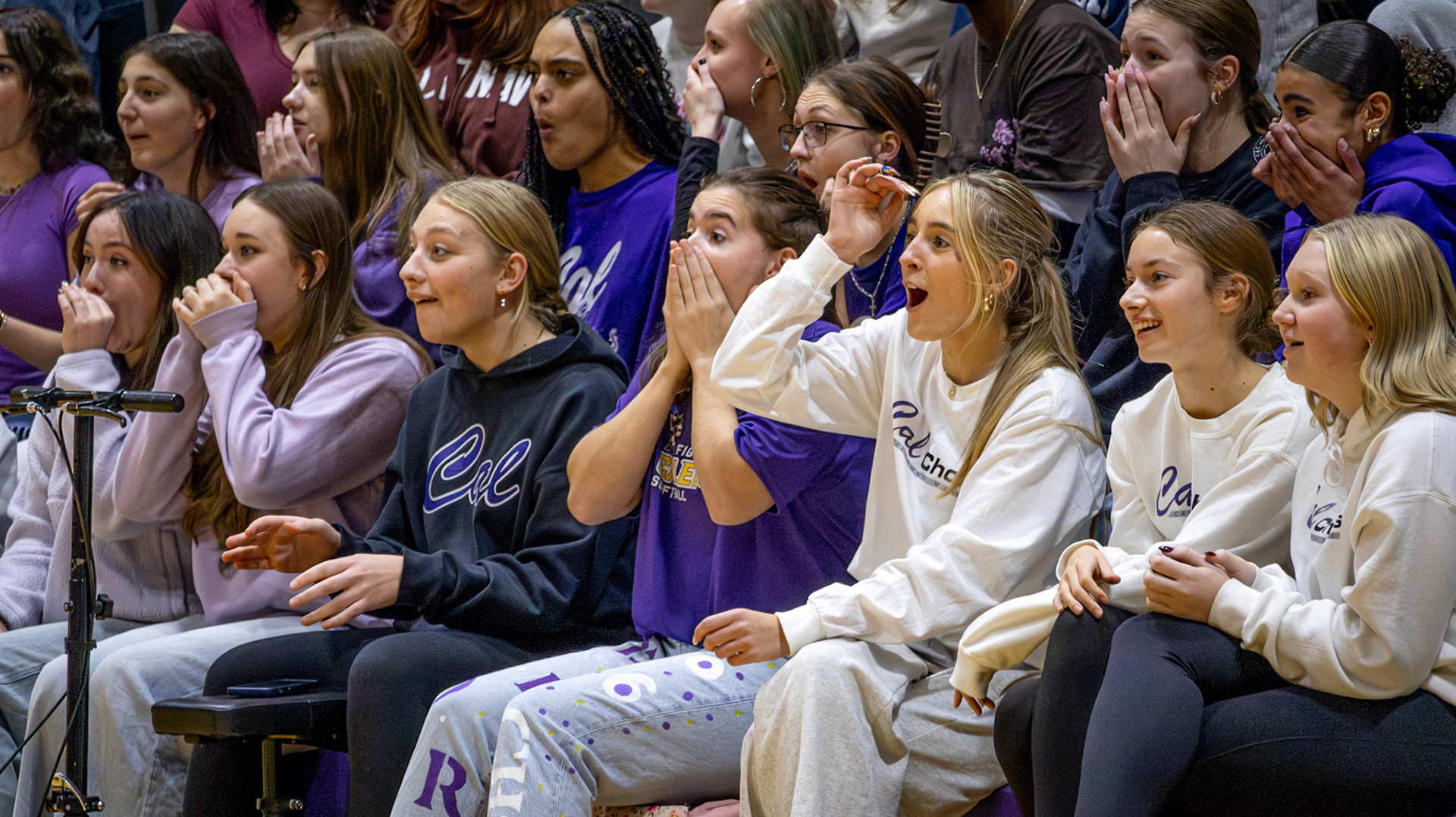 Watching a competitive game of musical chairs, Caledonia's Bella Voce membrers react as a someone falls diving for his chair once the music stops. (Photo by Ella-Grace Wickens)