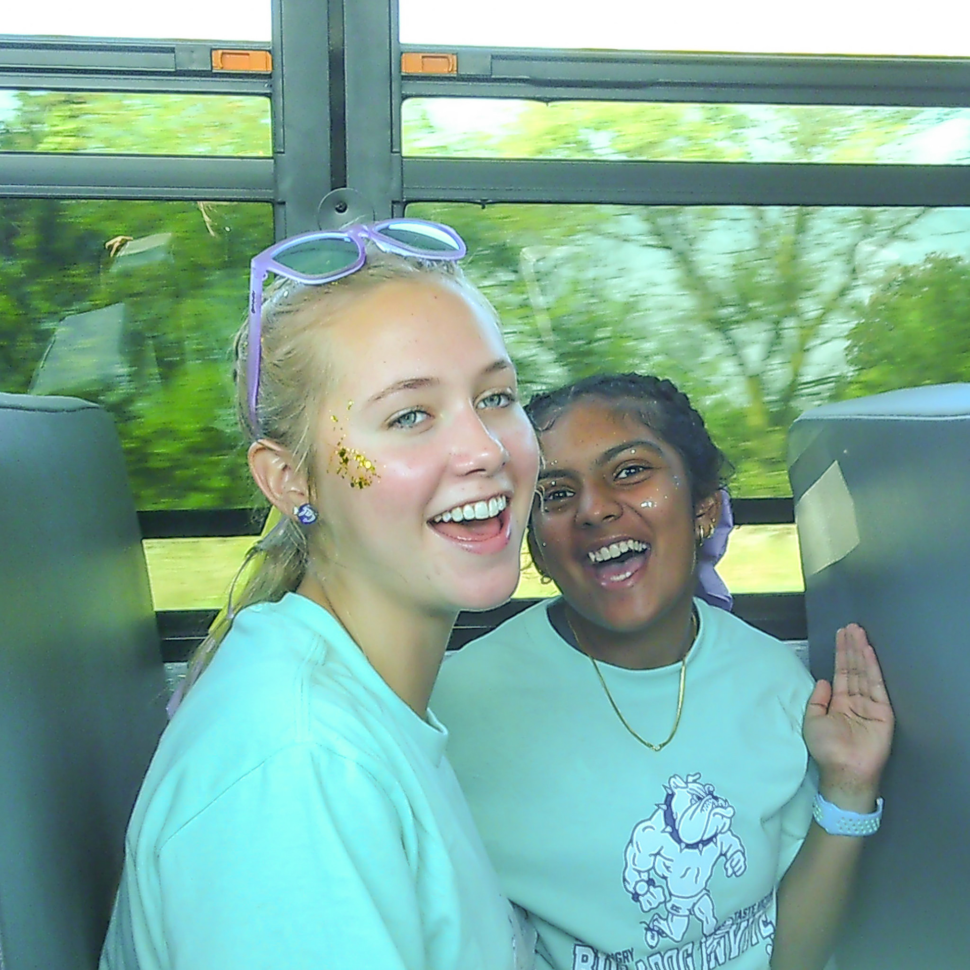 Ella Johnson and Shrimathi Thinniyam Sakthi Kumar celebrate after another great cross-country race. (Photo by Elise Clarin)