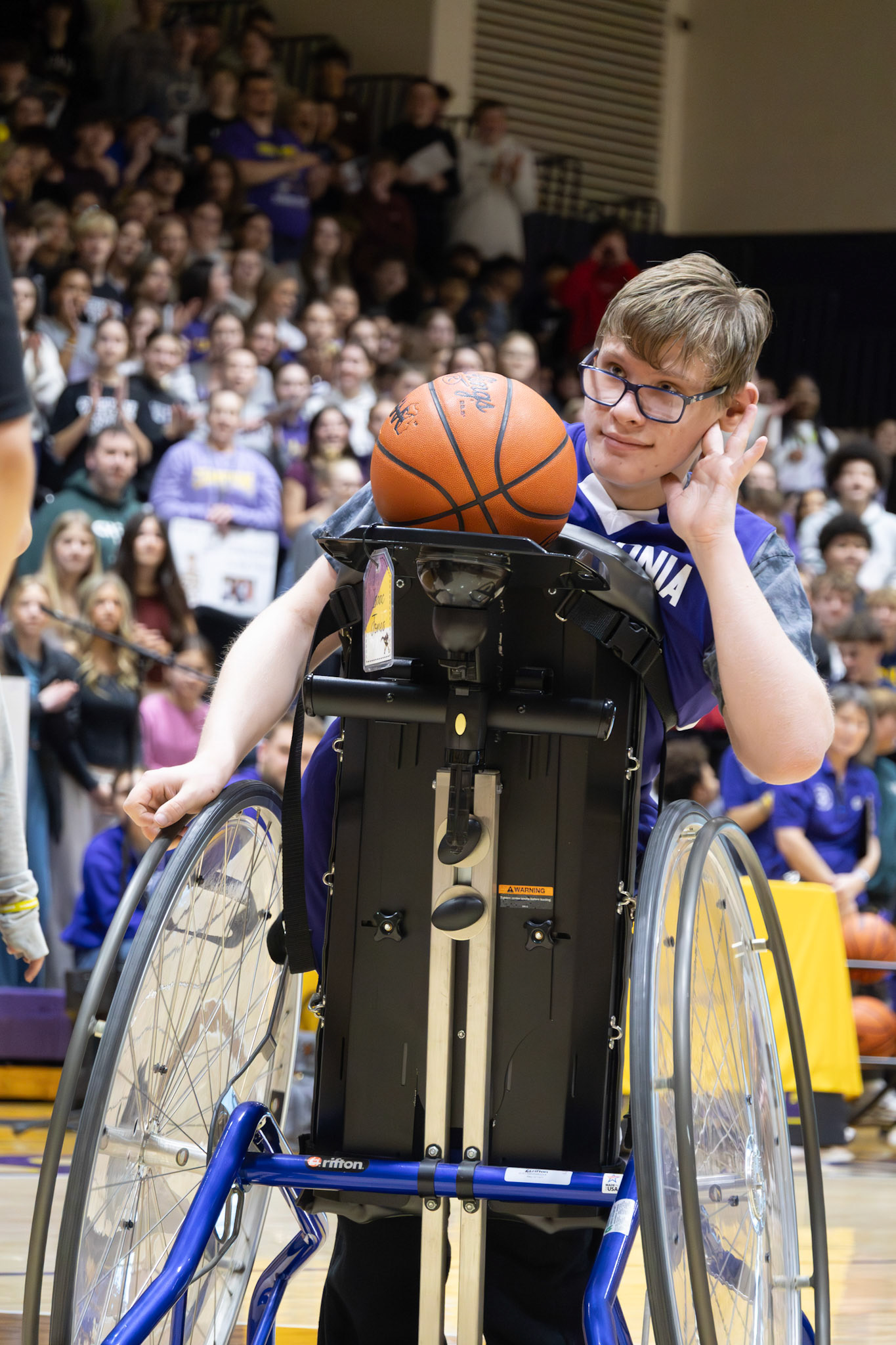 Isaac Jones wastes no time heading to the hoop after receiving the ball from his partner. (Photo by Avarey Lippert)