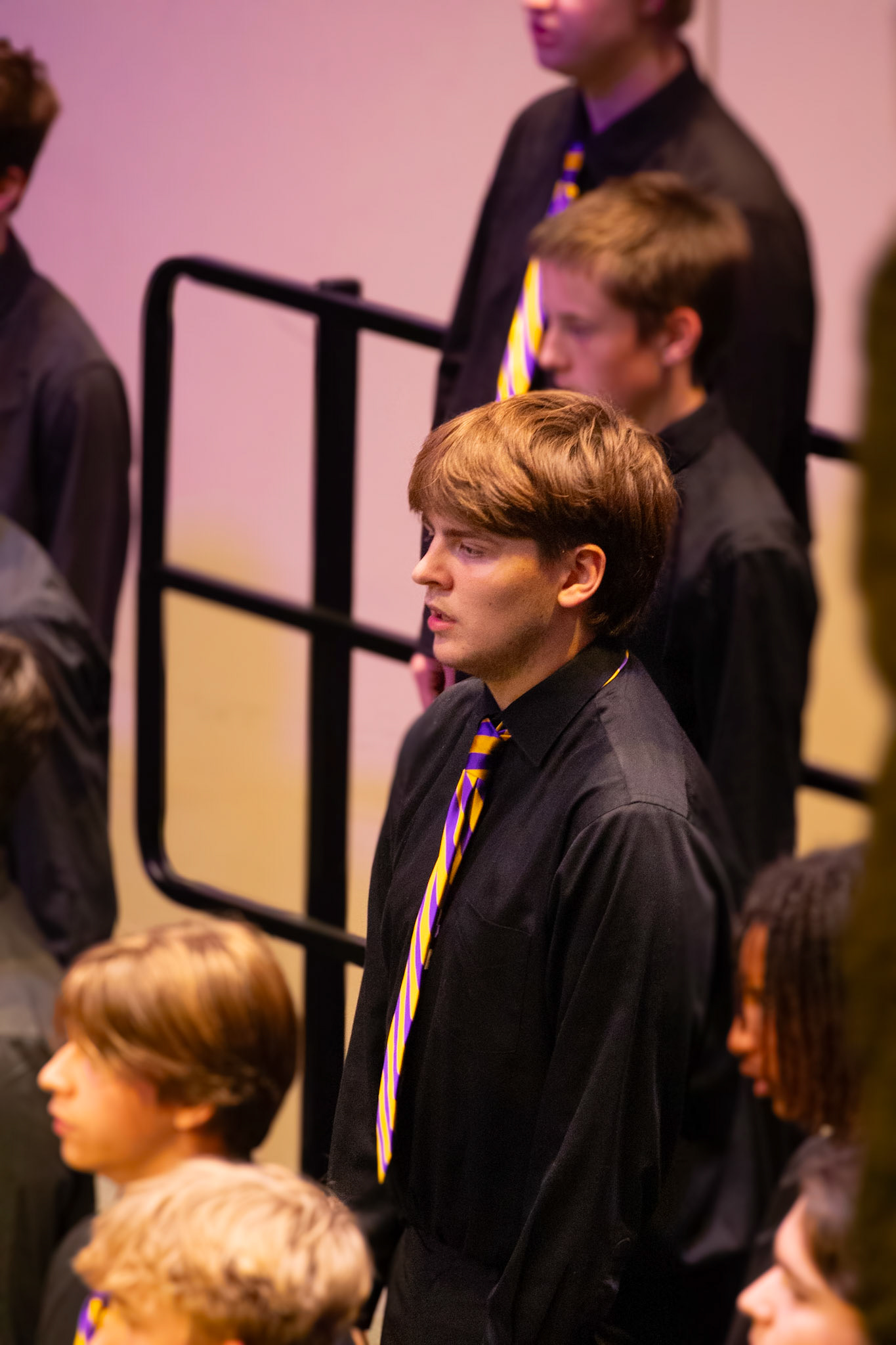 On stage, senior Jaren King showcases his tenor bass voice during the winter concert. (Photo By Brianna Severson)