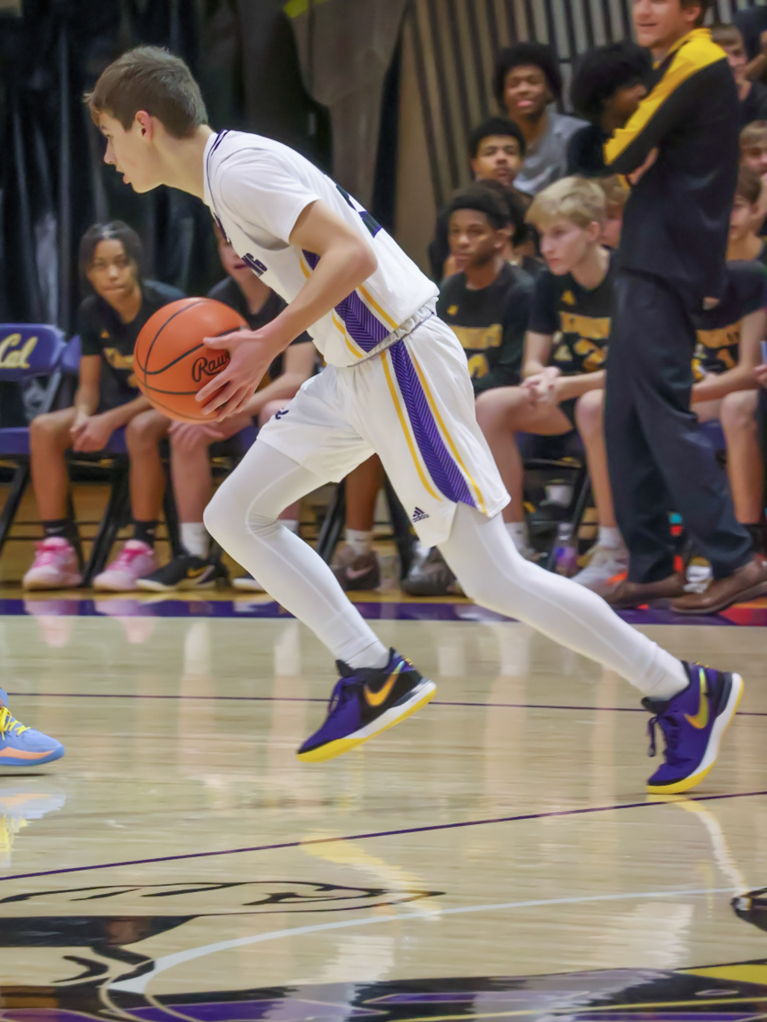 Ball in hand, eyes on the prize—Austin Guider moves swiftly toward the basket. (Photo by Mackenzie Popma)