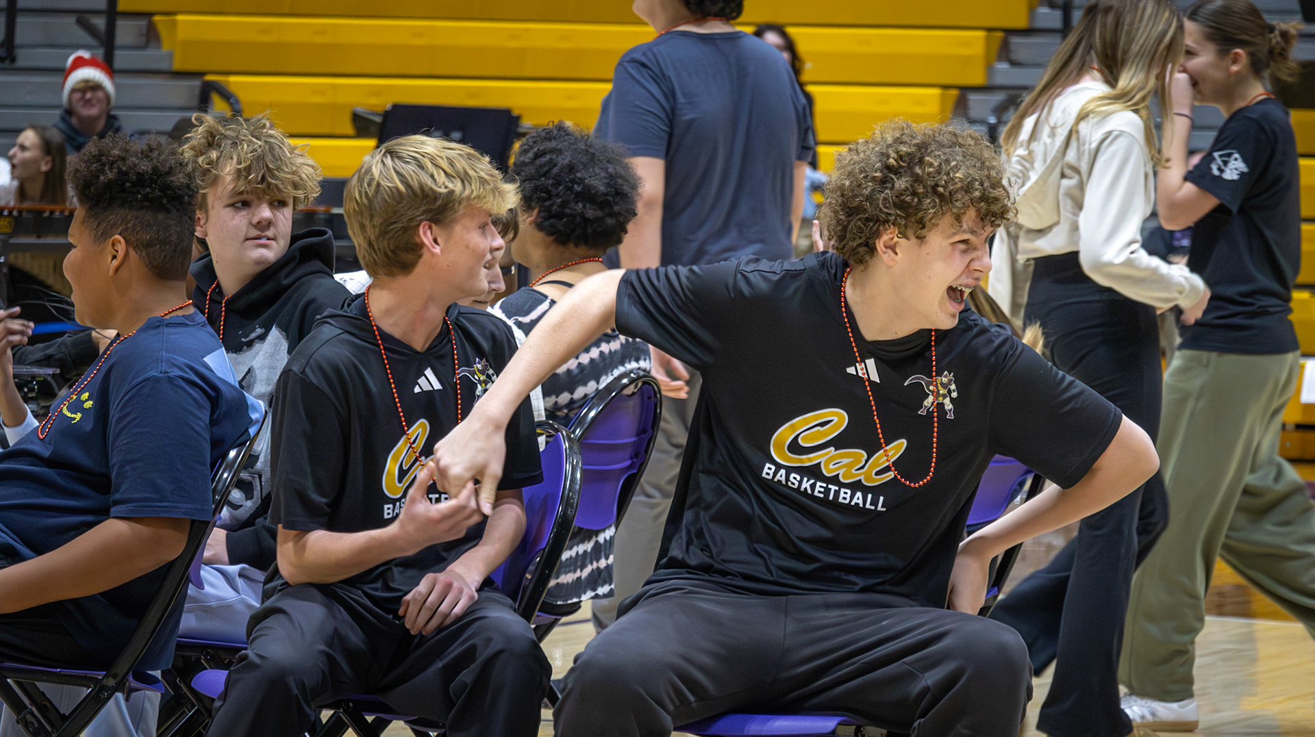 Tyler Cawthorne make it to the next round of musical chairs, determined to win. (Photo by Ella-Grace Wickens)