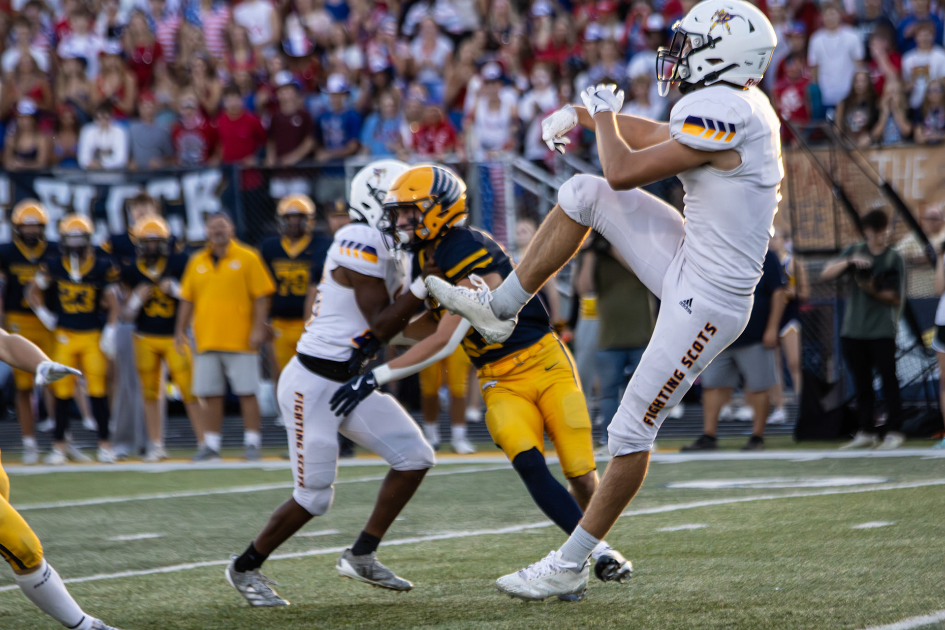 Aaron Collins makes an impressive pass during the Hudsonville game, showing his skill on the field. (Photo by Taya Penoes)