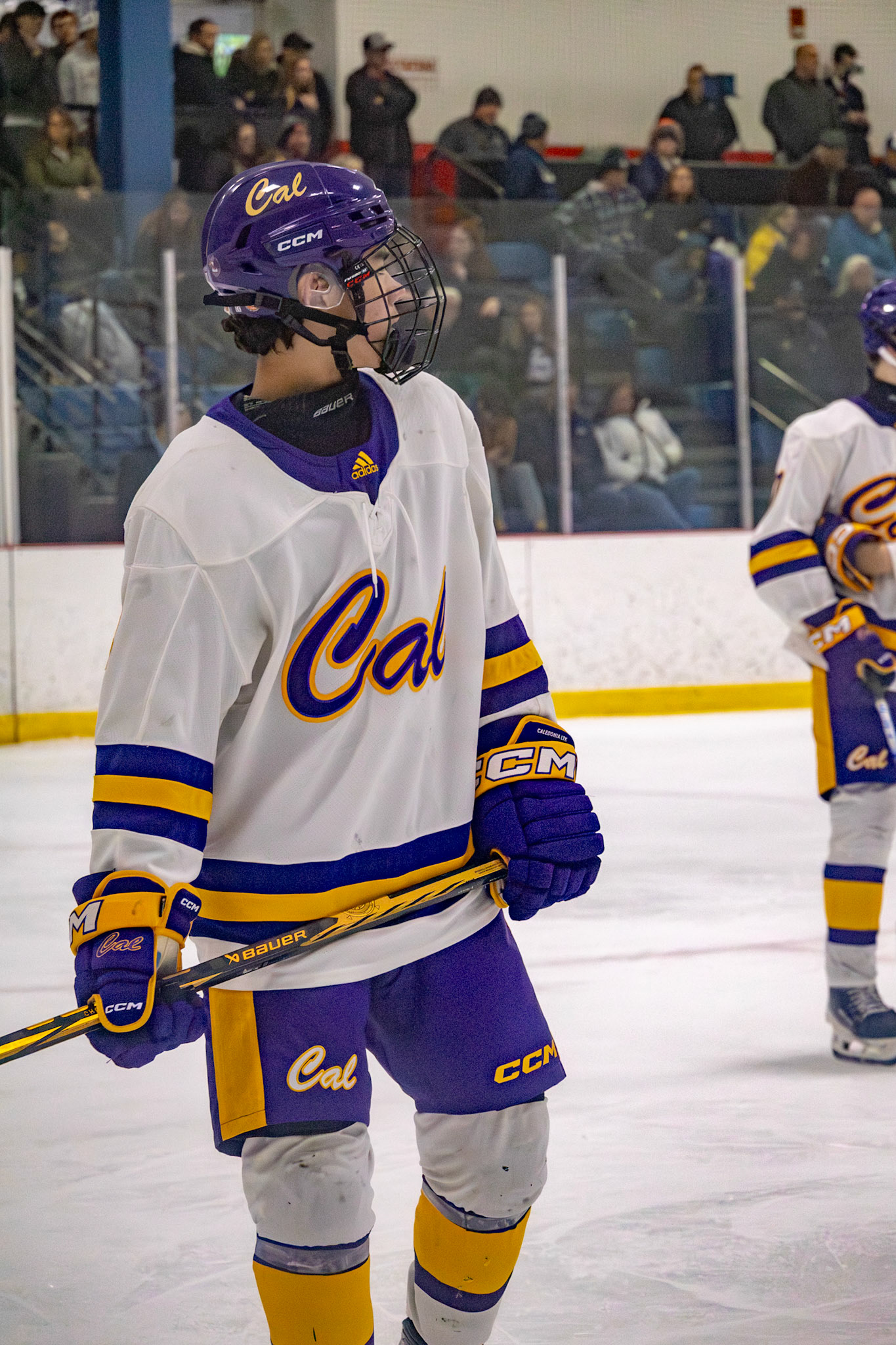 Freshman Evan Moore stands ready on the ice, awaiting the referee’s whistle for the face-off. (Photo by Avarey Lippert)