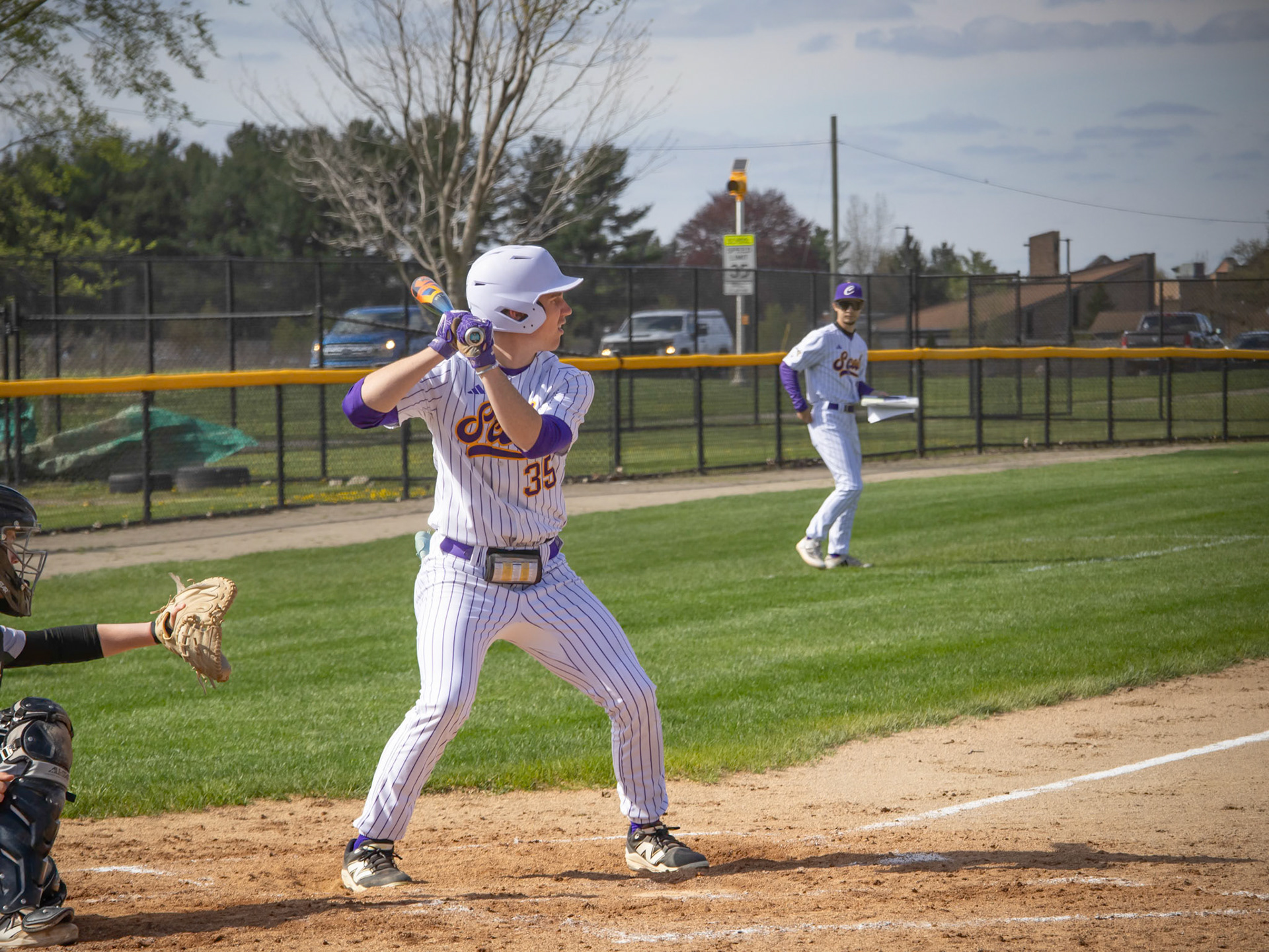 Keeping a close eye on the pitchers hand, Oliver Olmstead gets ready to swing at the next pitch. (Photo by Ella-Grace Wickens)