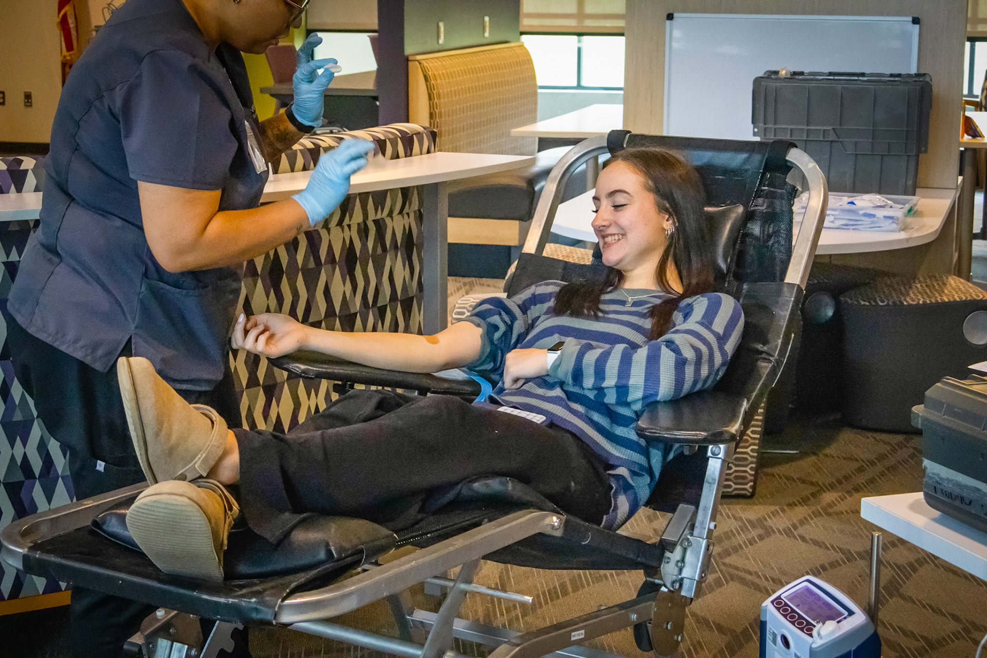 Lilli Jackson thanks the amazing phlobotomist who helped her donate blood at the NHS blood drive. (Photo by Ella-Grace Wickens)