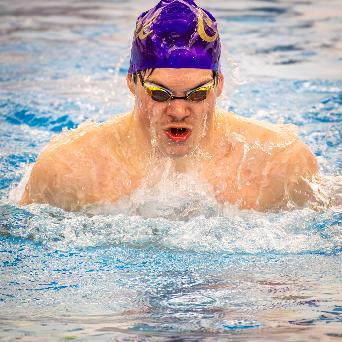 Andrew Barnum races hard towards the finish, determined to take first place for his teammates in the 200 yard medley relay. (Photo by Hailey Thayer)
