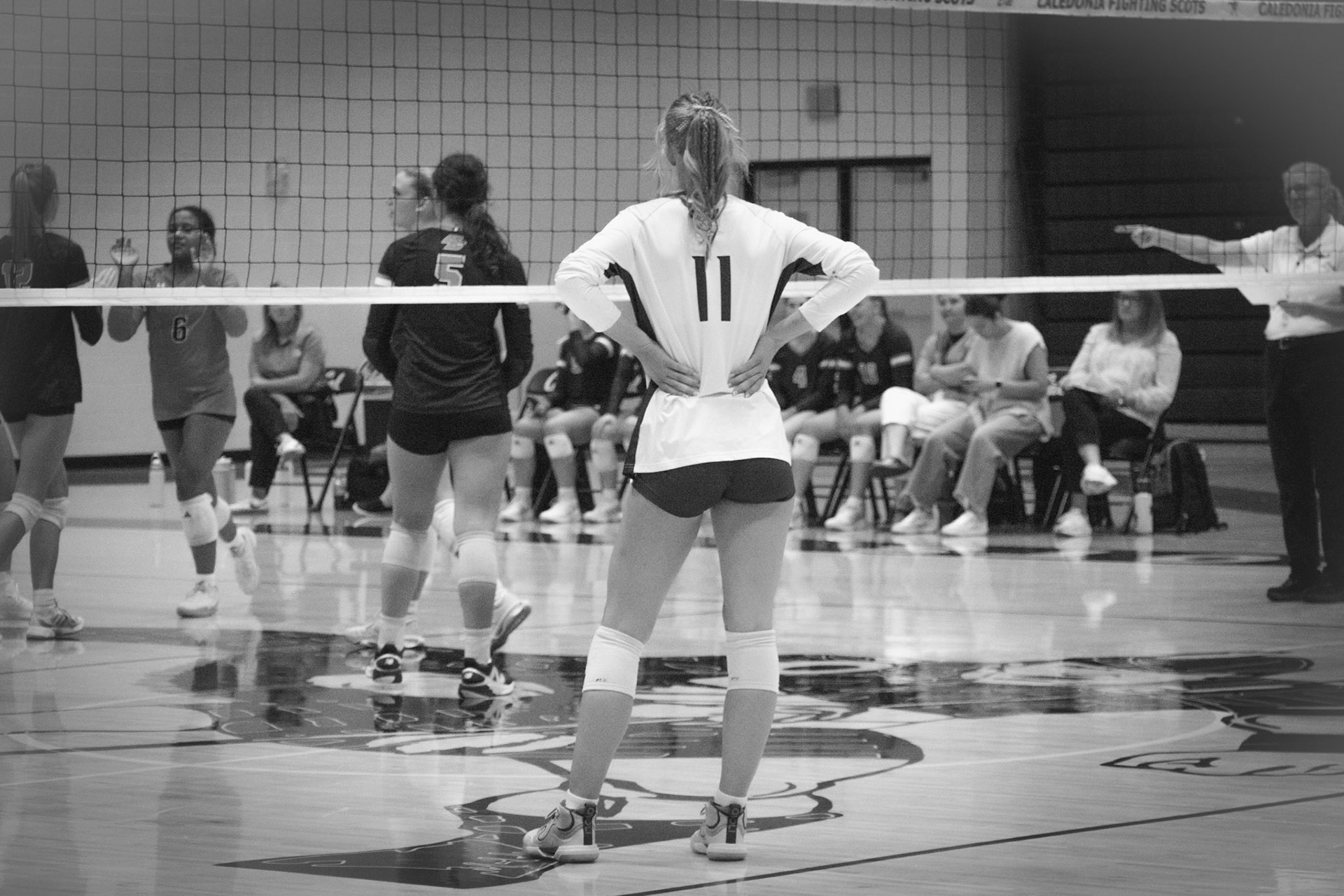 Maggie Loomis stands and observes the opponent ready to attack the next play. (Photo by Kortney Muller)